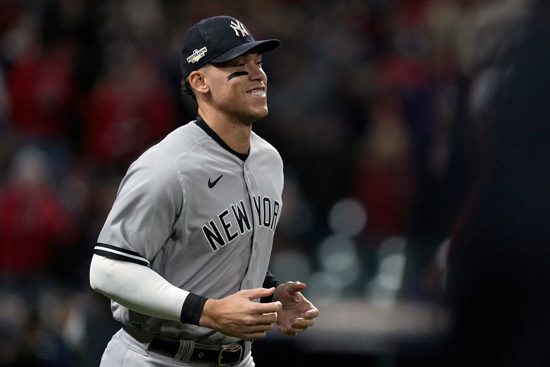CLEVELAND, OHIO - OCTOBER 15: Aaron Judge #99 of the New York Yankees runs onto the field before the start of the game against the Cleveland Guardians in game three of the American League Division Series at Progressive Field on October 15, 2022 in Cleveland, Ohio. (Photo by Dylan Buell/Getty Images)