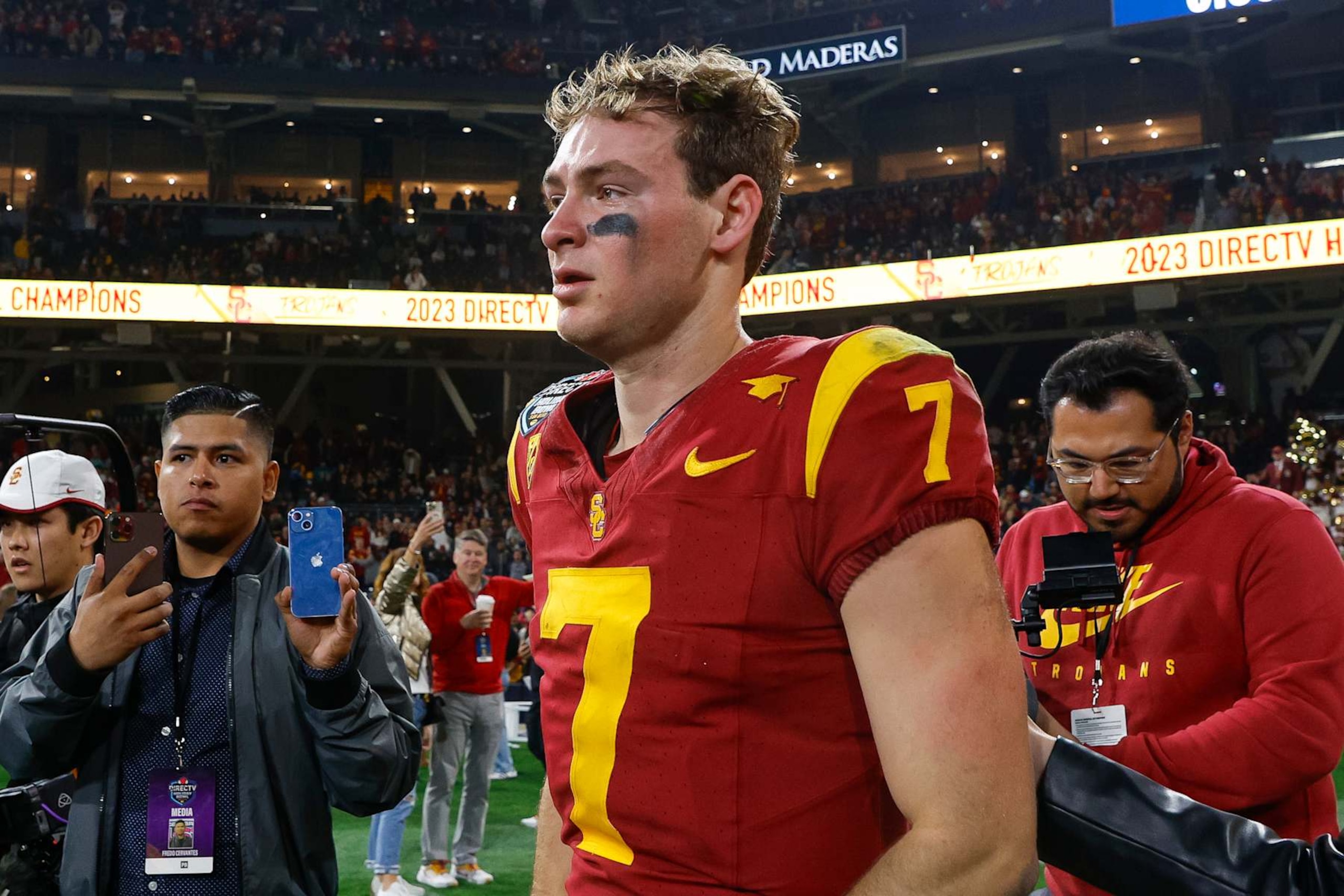 SAN DIEGO, CALIFORNIA - DECEMBER 27: Miller Moss #7 of the USC Trojans reacts after defeating the Louisville Cardinals 42-28 during the DIRECTV Holiday Bowl game at Petco Park on December 27, 2023 in San Diego, California. (Photo by Brandon Sloter/Getty Images)