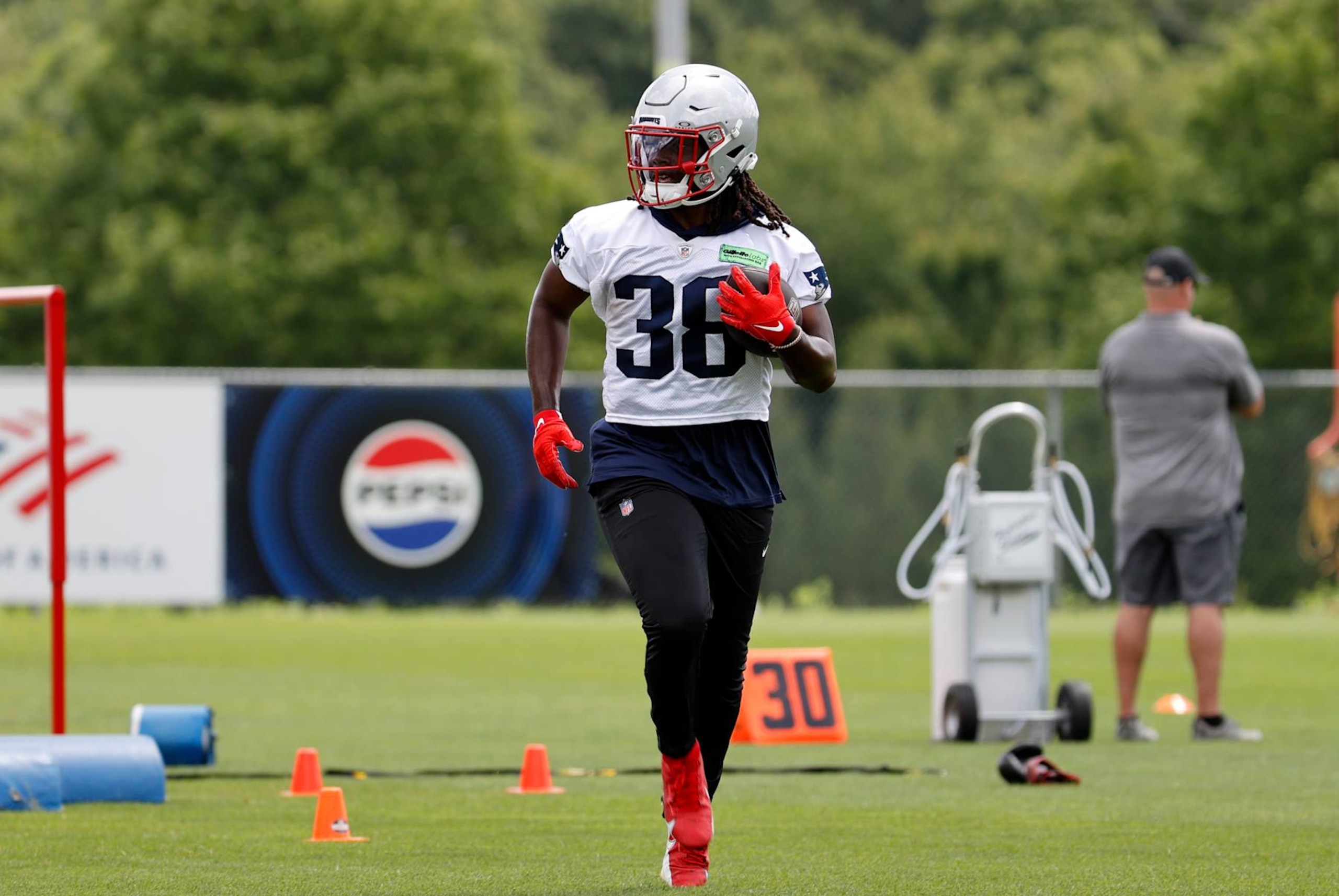FOXBOROUGH, MA - JUNE 12: New England Patriots running back Rhamondre Stevenson (38) during New England Patriots Minicamp on June 12, 2024, at The Patriots practice facility at Gillette Stadium in Foxborough, Massachusetts. (Photo by Fred Kfoury III/Icon Sportswire via Getty Images)