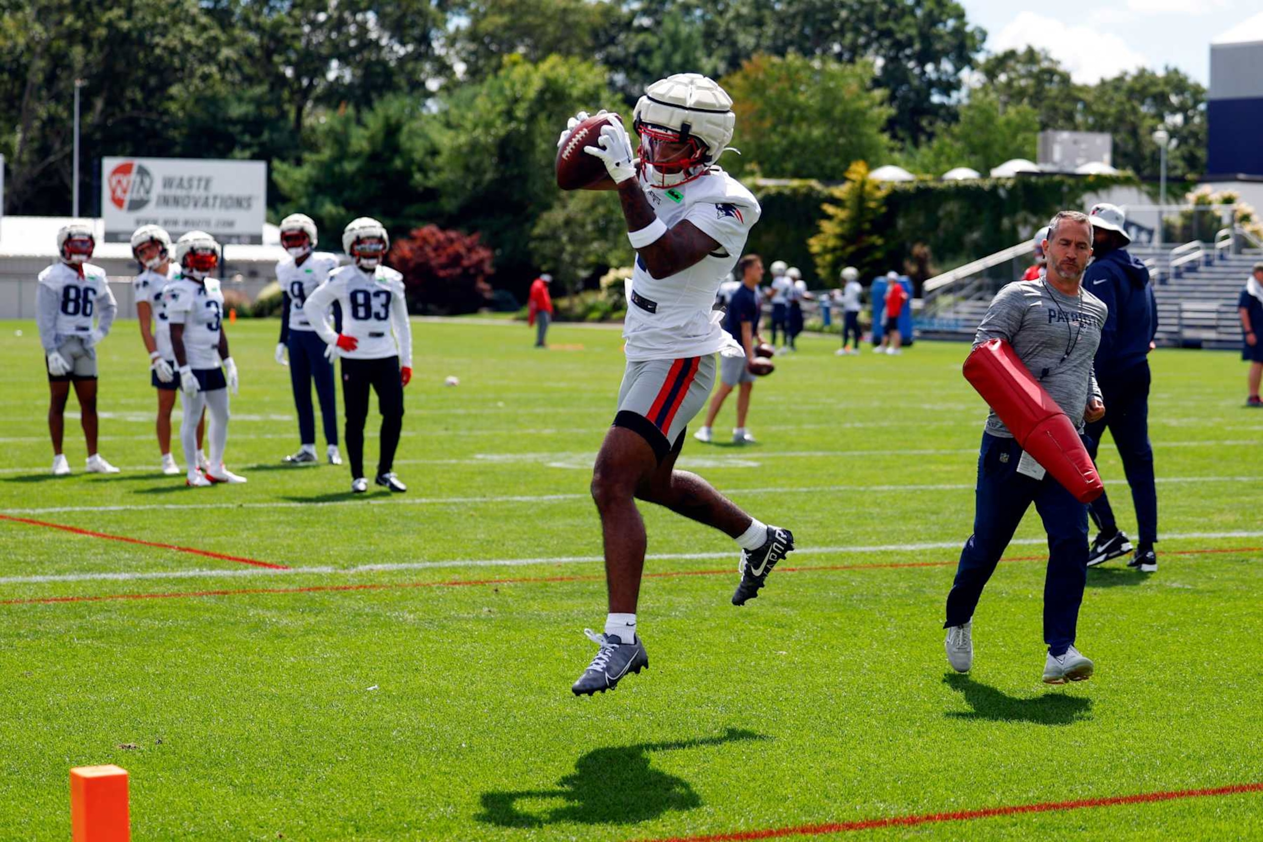Foxborough, MA - August 22: New England Patriots WR Ja'Lynn Polk makes a catch during practice at Gillette Stadium. (Photo by Danielle Parhizkaran/The Boston Globe via Getty Images)
