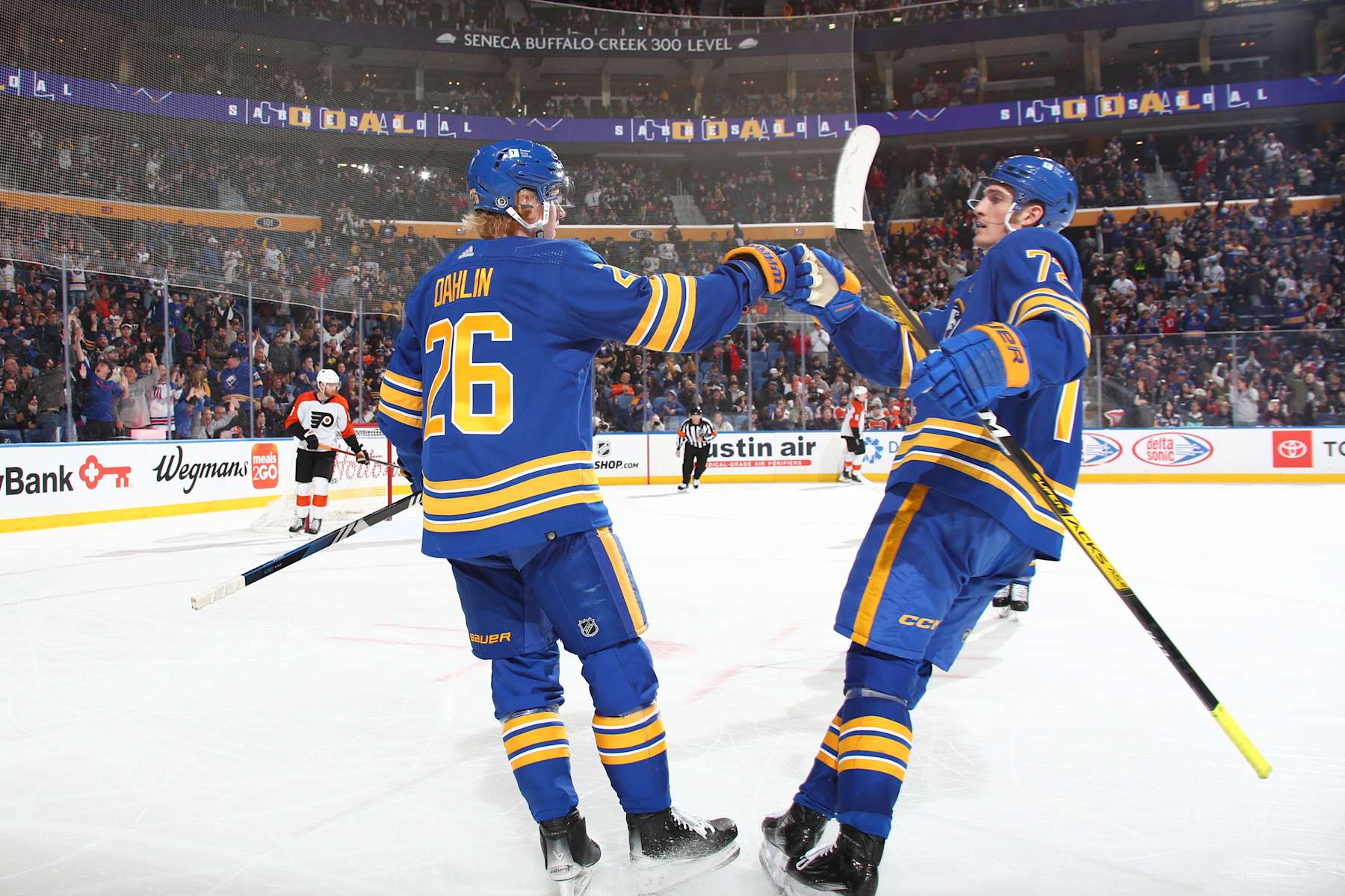 BUFFALO, NEW YORK - APRIL 5: Rasmus Dahlin #26 and Tage Thompson #72 of the Buffalo Sabres celebrate a goal against the Philadelphia Flyers during an NHL game on April 5, 2024 at KeyBank Center in Buffalo, New York. (Photo by Bill Wippert/NHLI via Getty Images)