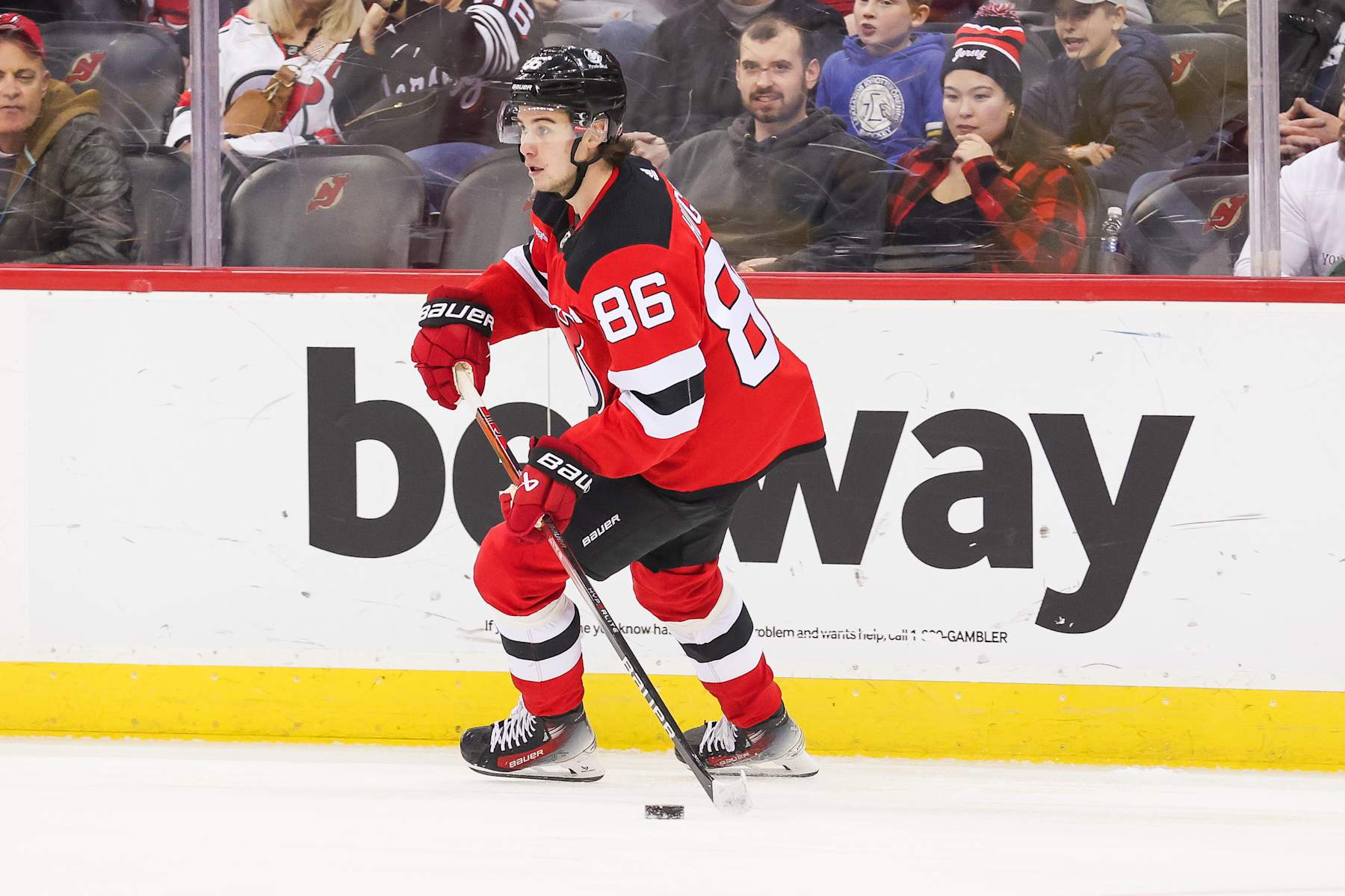 NEWARK, NJ - MARCH 07: New Jersey Devils center Jack Hughes (86) skates with the puck during a game between the St. Louis Blues and New Jersey Devils on March 7, 2024 at Prudential Center in the Newark, New Jersey. (Photo by Andrew Mordzynski/Icon Sportswire via Getty Images)