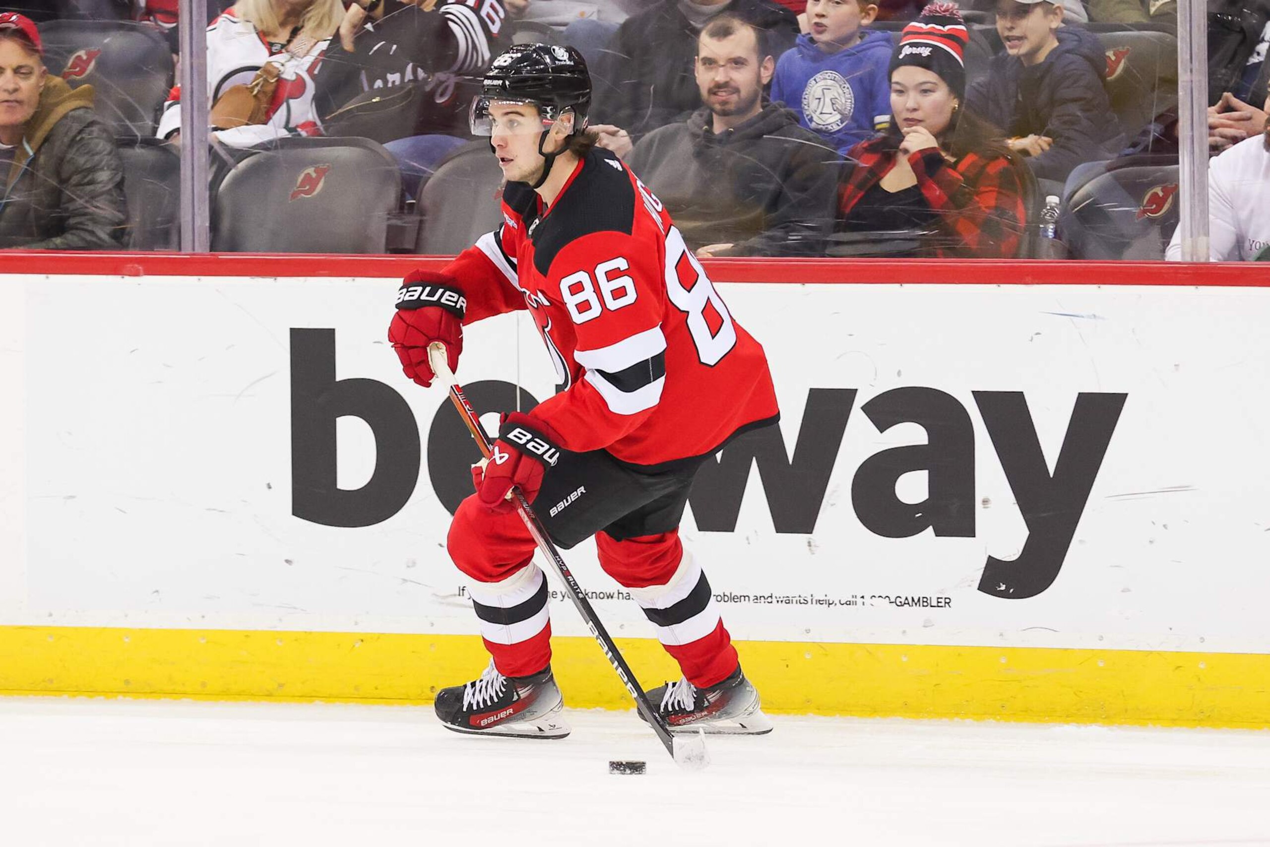 NEWARK, NJ - MARCH 07: New Jersey Devils center Jack Hughes (86) skates with the puck during a game between the St. Louis Blues and New Jersey Devils on March 7, 2024 at Prudential Center in the Newark, New Jersey. (Photo by Andrew Mordzynski/Icon Sportswire via Getty Images) NEWARK, NJ - MARCH 07: New Jersey Devils center Jack Hughes (86) skates with the puck during a game between the St. Louis Blues and New Jersey Devils on March 7, 2024 at Prudential Center in the Newark, New Jersey. (Photo by Andrew Mordzynski/Icon Sportswire via Getty Images)