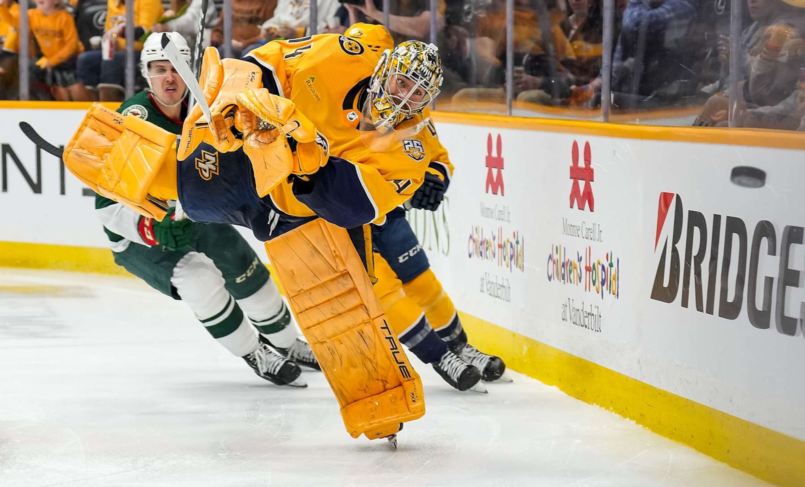 NASHVILLE, TENNESSEE - FEBRUARY 29: Juuse Saros #74 of the Nashville Predators clears the puck against the Minnesota Wild during an NHL game at Bridgestone Arena on February 29, 2024 in Nashville, Tennessee. (Photo by John Russell/NHLI via Getty Images) NASHVILLE, TENNESSEE - FEBRUARY 29: Juuse Saros #74 of the Nashville Predators clears the puck against the Minnesota Wild during an NHL game at Bridgestone Arena on February 29, 2024 in Nashville, Tennessee. (Photo by John Russell/NHLI via Getty Images)