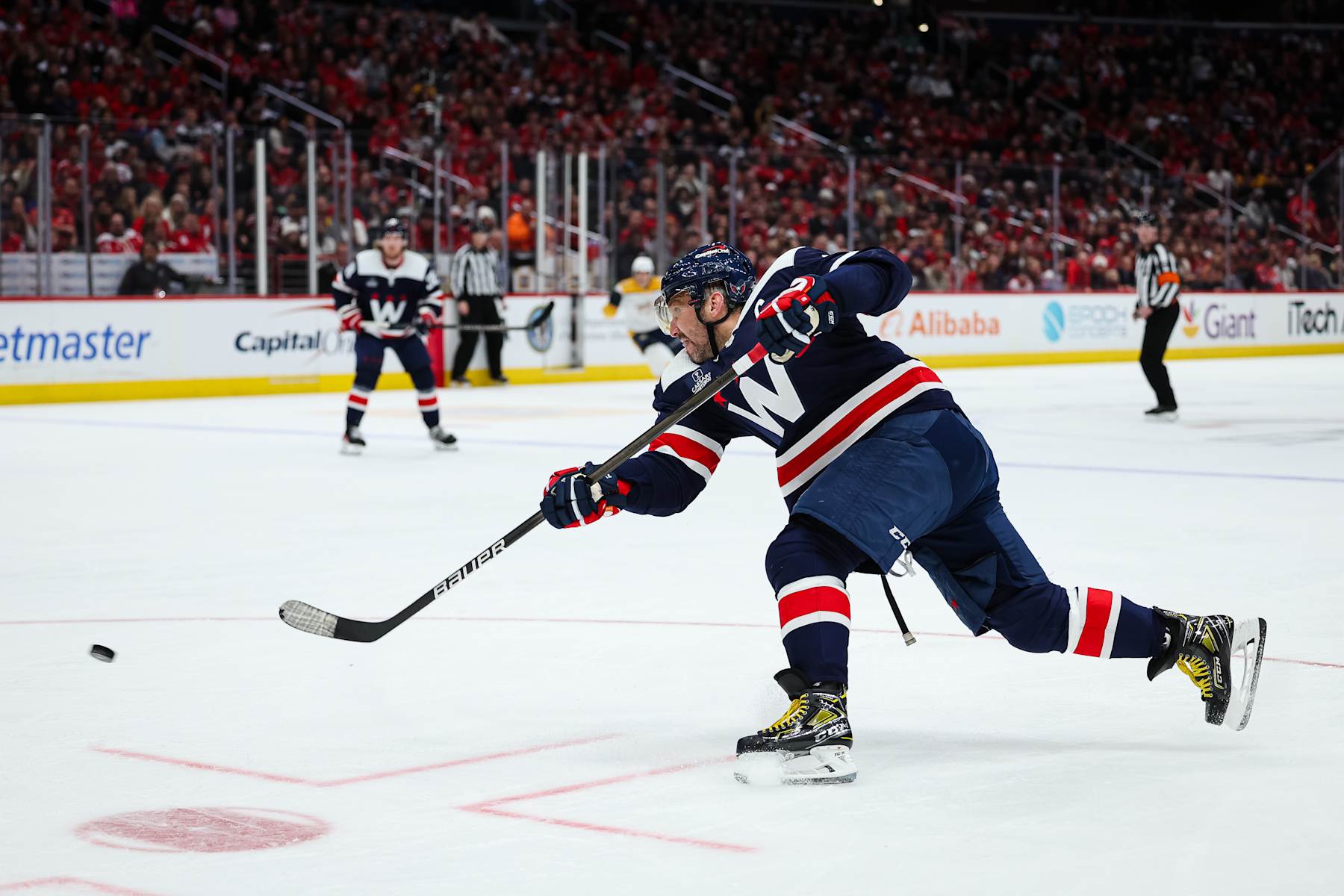 WASHINGTON, DC - DECEMBER 30: Alex Ovechkin #8 of the Washington Capitals scores a goal against the Nashville Predators during the second period of the game at Capital One Arena on December 30, 2023 in Washington, DC. (Photo by Scott Taetsch/Getty Images)