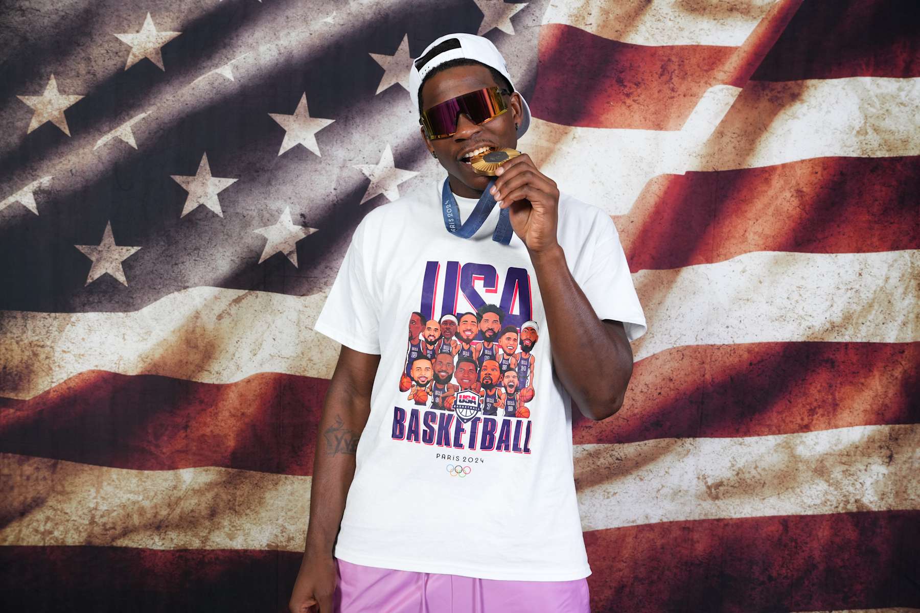 PARIS, FRANCE - AUGUST 10: Anthony Edwards of the USA Men's National Team poses for portraits with the Gold Medal at the hotel on August 10, 2024 in Paris, France. NOTE TO USER: User expressly acknowledges and agrees that, by downloading and/or using this photograph, user is consenting to the terms and conditions of the Getty Images License Agreement. Mandatory Copyright Notice: Copyright 2024 NBAE (Photo by Jesse D. Garrabrant/NBAE via Getty Images)