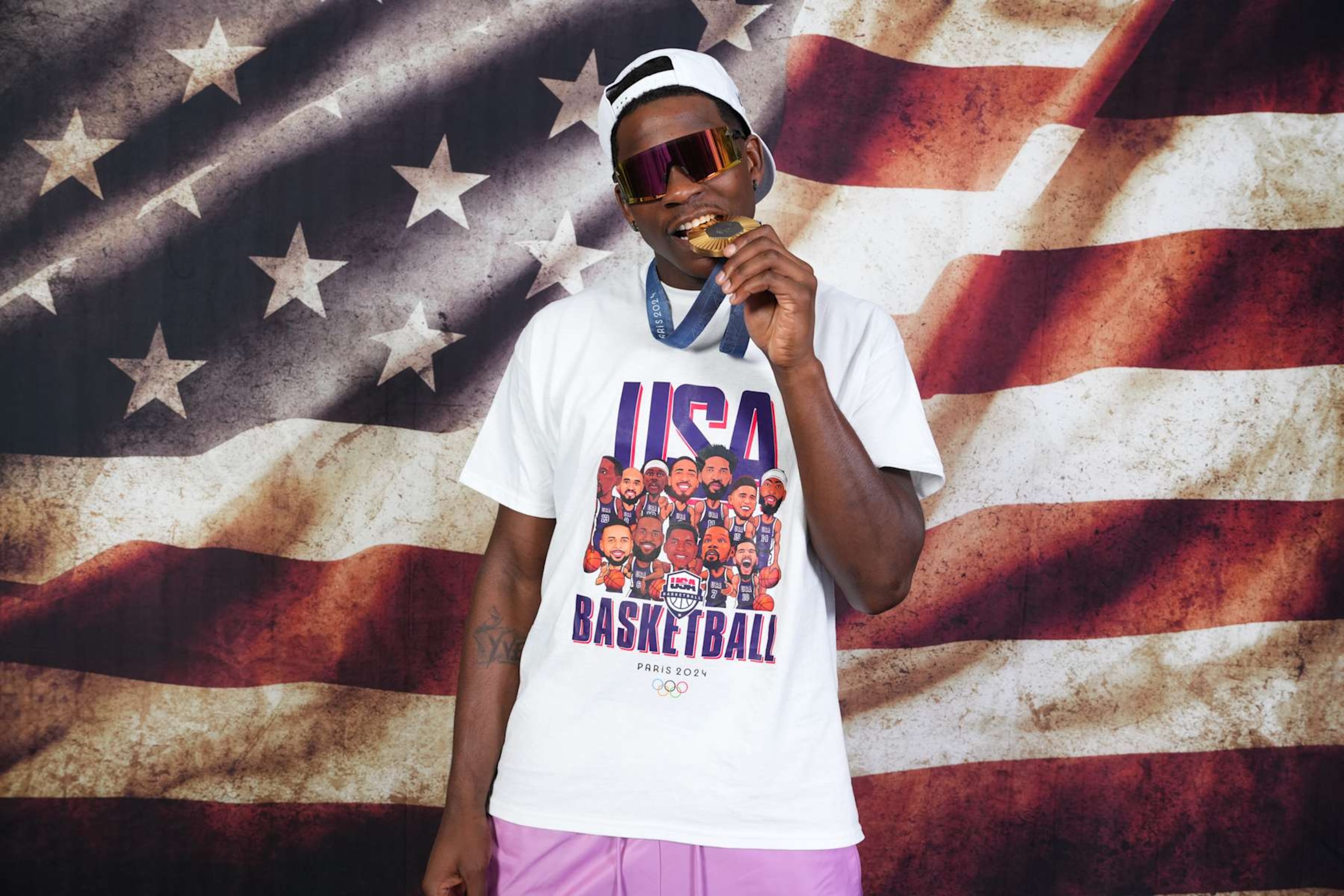 PARIS, FRANCE - AUGUST 10: Anthony Edwards of the USA Men's National Team poses for portraits with the Gold Medal at the hotel on August 10, 2024 in Paris, France. NOTE TO USER: User expressly acknowledges and agrees that, by downloading and/or using this photograph, user is consenting to the terms and conditions of the Getty Images License Agreement. Mandatory Copyright Notice: Copyright 2024 NBAE (Photo by Jesse D. Garrabrant/NBAE via Getty Images) PARIS, FRANCE - AUGUST 10: Anthony Edwards of the USA Men's National Team poses for portraits with the Gold Medal at the hotel on August 10, 2024 in Paris, France. NOTE TO USER: User expressly acknowledges and agrees that, by downloading and/or using this photograph, user is consenting to the terms and conditions of the Getty Images License Agreement. Mandatory Copyright Notice: Copyright 2024 NBAE (Photo by Jesse D. Garrabrant/NBAE via Getty Images)