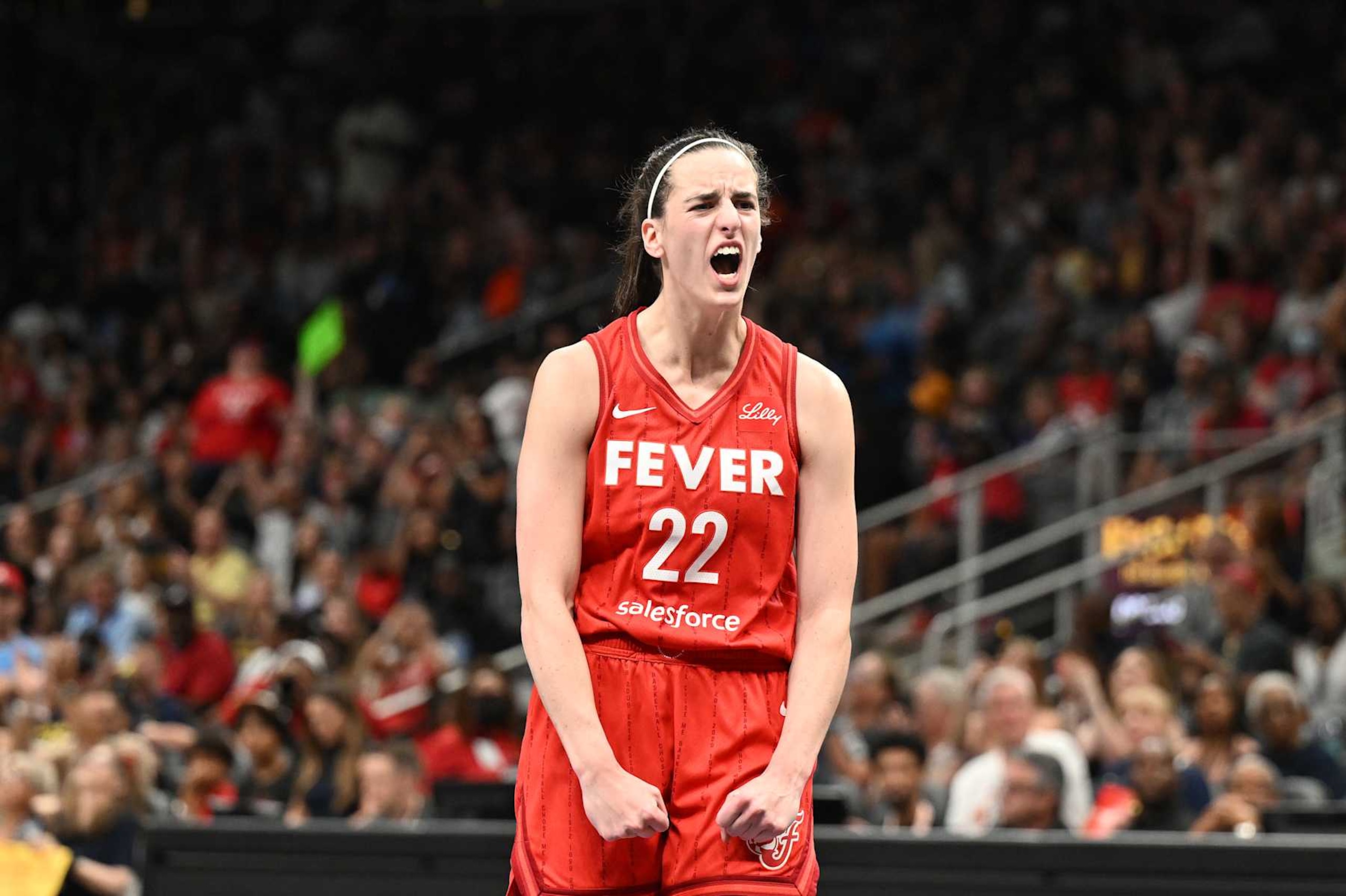 ATLANTA, GEORGIA - AUGUST 26: Caitlin Clark #22 of the Indiana Fever reacts against the Atlanta Dream on August 26, 2024 at State Farm Arena in Atlanta, Georgia. NOTE TO USER: User expressly acknowledges and agrees that, by downloading and or using this photograph, User is consenting to the terms and conditions of the Getty Images License Agreement. (Photo by Paras Griffin/Getty Images) ATLANTA, GEORGIA - AUGUST 26: Caitlin Clark #22 of the Indiana Fever reacts against the Atlanta Dream on August 26, 2024 at State Farm Arena in Atlanta, Georgia. NOTE TO USER: User expressly acknowledges and agrees that, by downloading and or using this photograph, User is consenting to the terms and conditions of the Getty Images License Agreement. (Photo by Paras Griffin/Getty Images)