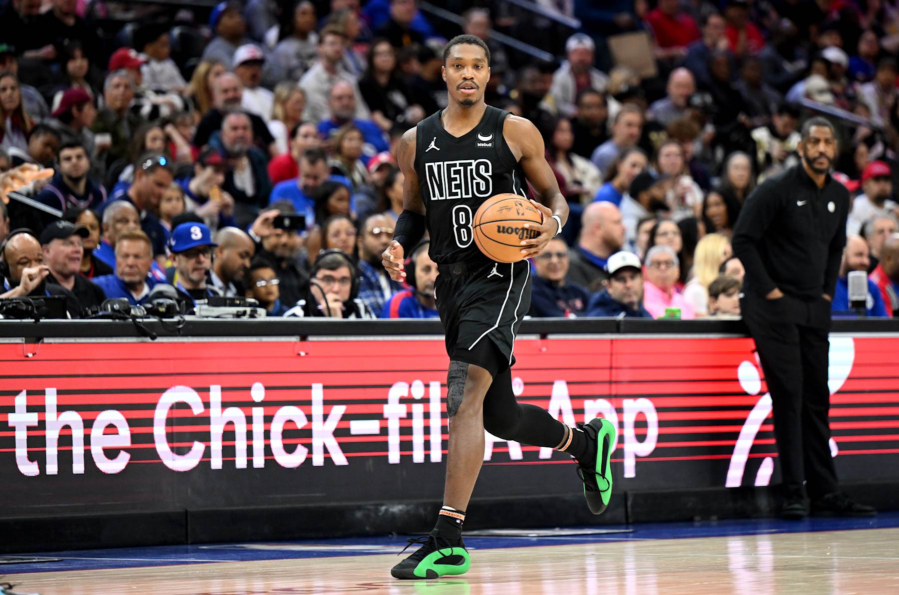 PHILADELPHIA, PENNSYLVANIA - APRIL 14: Lonnie Walker IV #8 of the Brooklyn Nets handles the ball against the Philadelphia 76ers at the Wells Fargo Center on April 14, 2024 in Philadelphia, Pennsylvania.  NOTE TO USER: User expressly acknowledges and agrees that, by downloading and or using this photograph, User is consenting to the terms and conditions of the Getty Images License Agreement. (Photo by G Fiume/Getty Images)