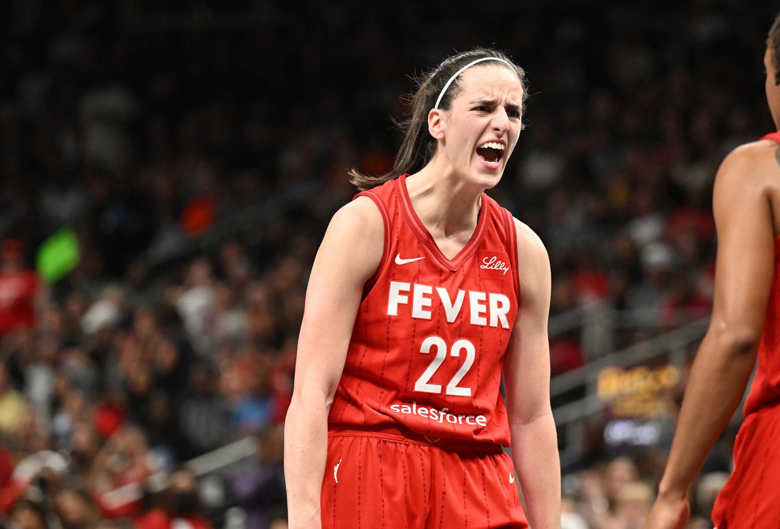 ATLANTA, GEORGIA - AUGUST 26: Caitlin Clark #22 of the Indiana Fever reacts against the Atlanta Dream on August 26, 2024 at State Farm Arena in Atlanta, Georgia. NOTE TO USER: User expressly acknowledges and agrees that, by downloading and or using this photograph, User is consenting to the terms and conditions of the Getty Images License Agreement. (Photo by Paras Griffin/Getty Images)