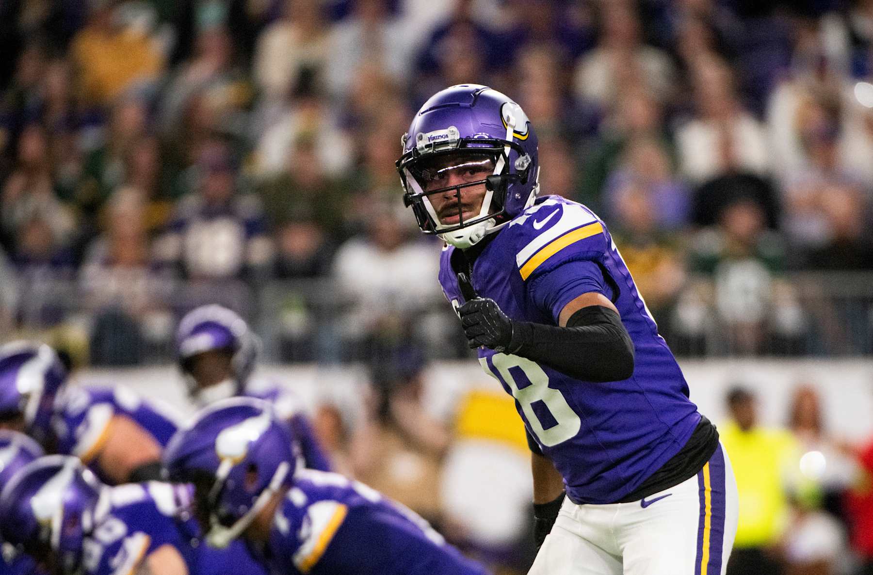 MINNEAPOLIS, MINNESOTA - DECEMBER 31: Justin Jefferson #18 of the Minnesota Vikings lines up for a play in the second quarter of the game against the Green Bay Packers at U.S. Bank Stadium on December 31, 2023 in Minneapolis, Minnesota. (Photo by Stephen Maturen/Getty Images)