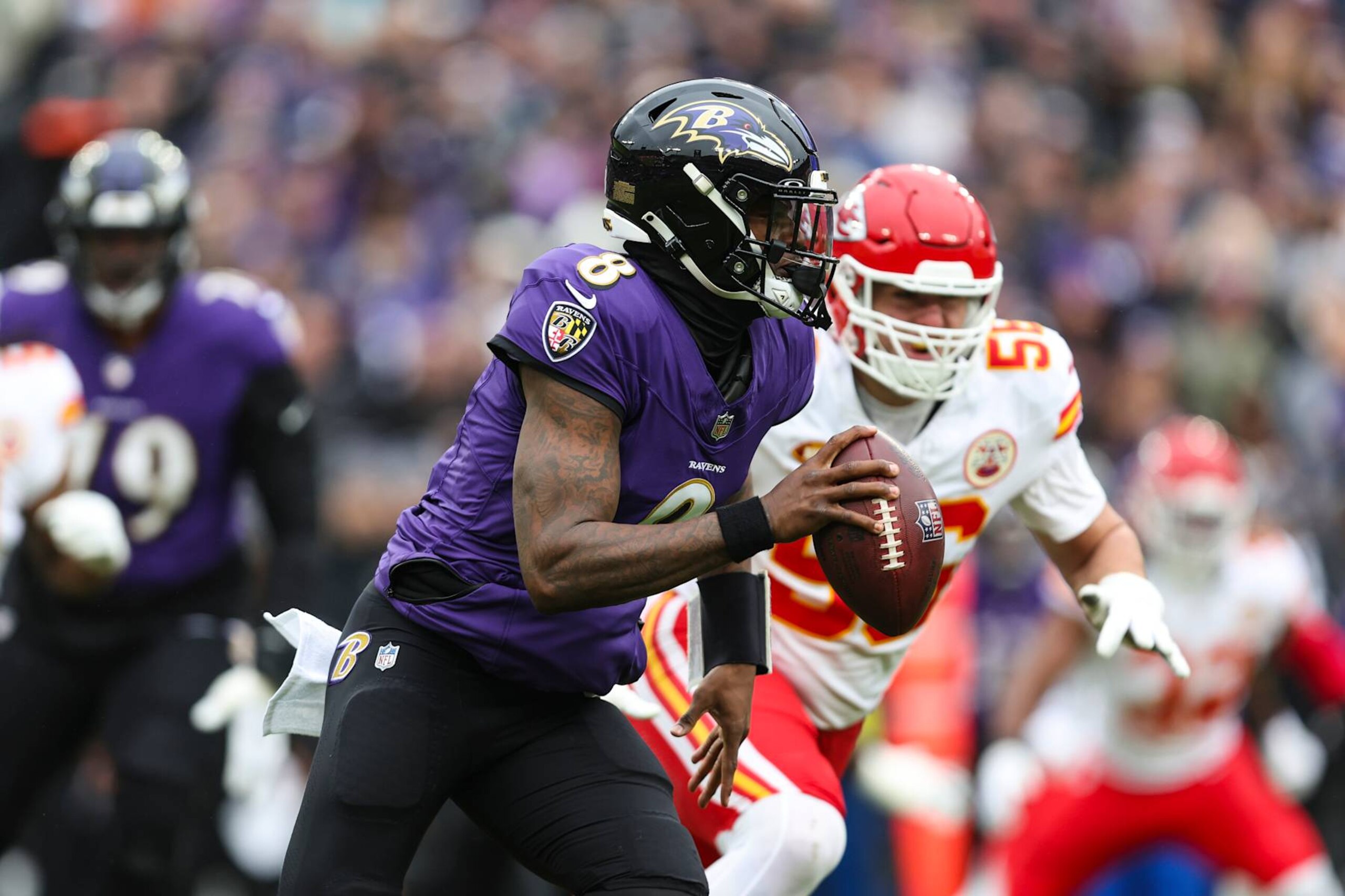 BALTIMORE, MD - JANUARY 28: Lamar Jackson #8 of the Baltimore Ravens runs the ball during the AFC Championship NFL football game against the Kansas City Chiefs at M&T Bank Stadium on January 28, 2024 in Baltimore, Maryland. (Photo by Perry Knotts/Getty Images) BALTIMORE, MD - JANUARY 28: Lamar Jackson #8 of the Baltimore Ravens runs the ball during the AFC Championship NFL football game against the Kansas City Chiefs at M&T Bank Stadium on January 28, 2024 in Baltimore, Maryland. (Photo by Perry Knotts/Getty Images)