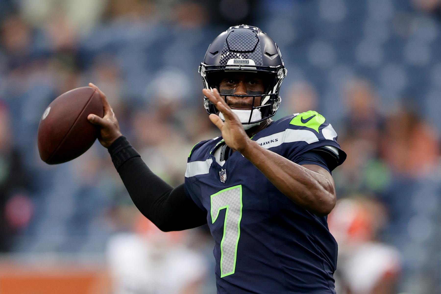 SEATTLE, WASHINGTON - AUGUST 24: Quarterback Geno Smith #7 of the Seattle Seahawks warms up prior to an NFL preseason game at Lumen Field on August 24, 2024 in Seattle, Washington. (Photo by Rio Giancarlo/Getty Images)