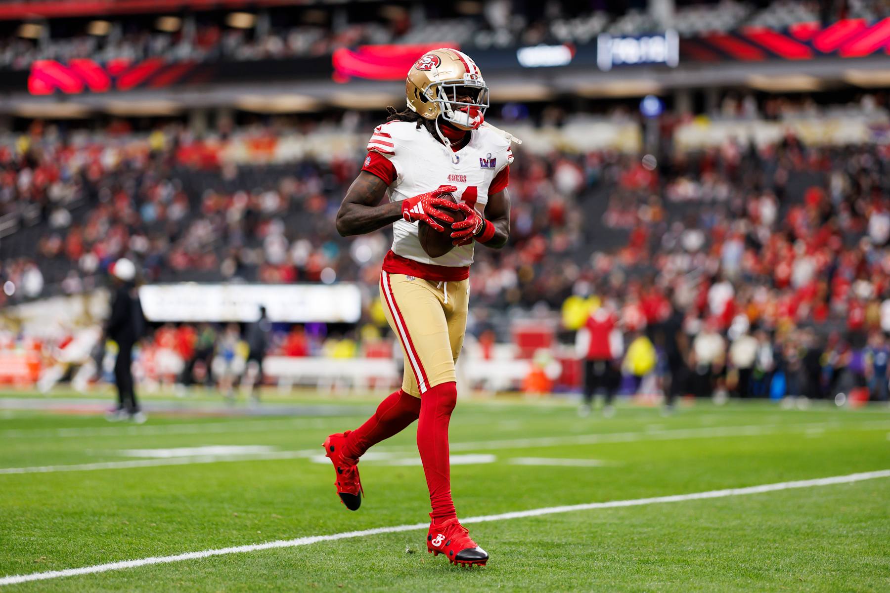 LAS VEGAS, NEVADA - FEBRUARY 11: Brandon Aiyuk #11 of the San Francisco 49ers runs the ball during pregame warmups before Super Bowl LVIII against the Kansas City Chiefs at Allegiant Stadium on February 11, 2024 in Las Vegas, Nevada. (Photo by Ryan Kang/Getty Images)