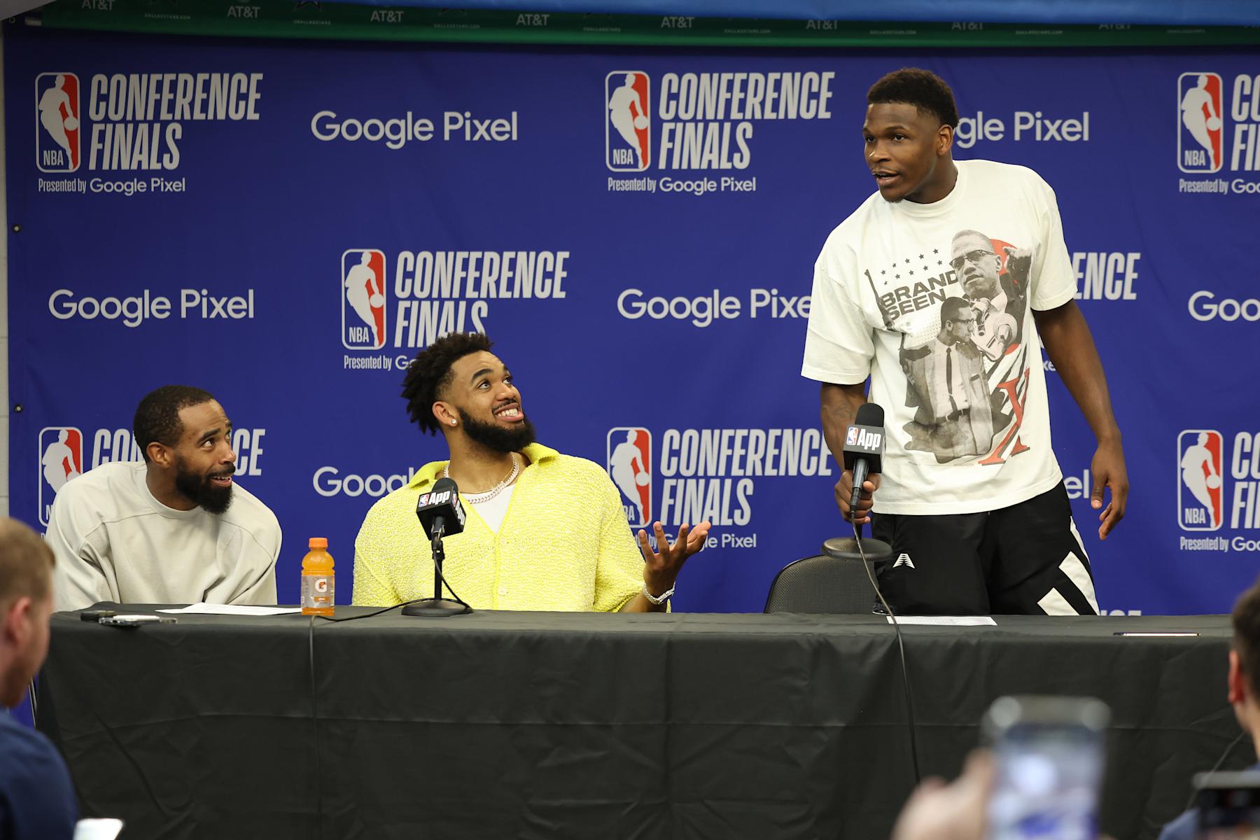 DALLAS, TX - MAY 28: Karl-Anthony Towns #32, Anthony Edwards #5 and Mike Conley #10 of the Minnesota Timberwolves are interviewed by the media after the game against the Dallas Mavericks during Round 3 Game 4 of the 2024 NBA Playoffs on May 28, 2024 at the American Airlines Center in Dallas, Texas. NOTE TO USER: User expressly acknowledges and agrees that, by downloading and or using this photograph, User is consenting to the terms and conditions of the Getty Images License Agreement. Mandatory Copyright Notice: Copyright 2024 NBAE (Photo by David Sherman /NBAE via Getty Images)
