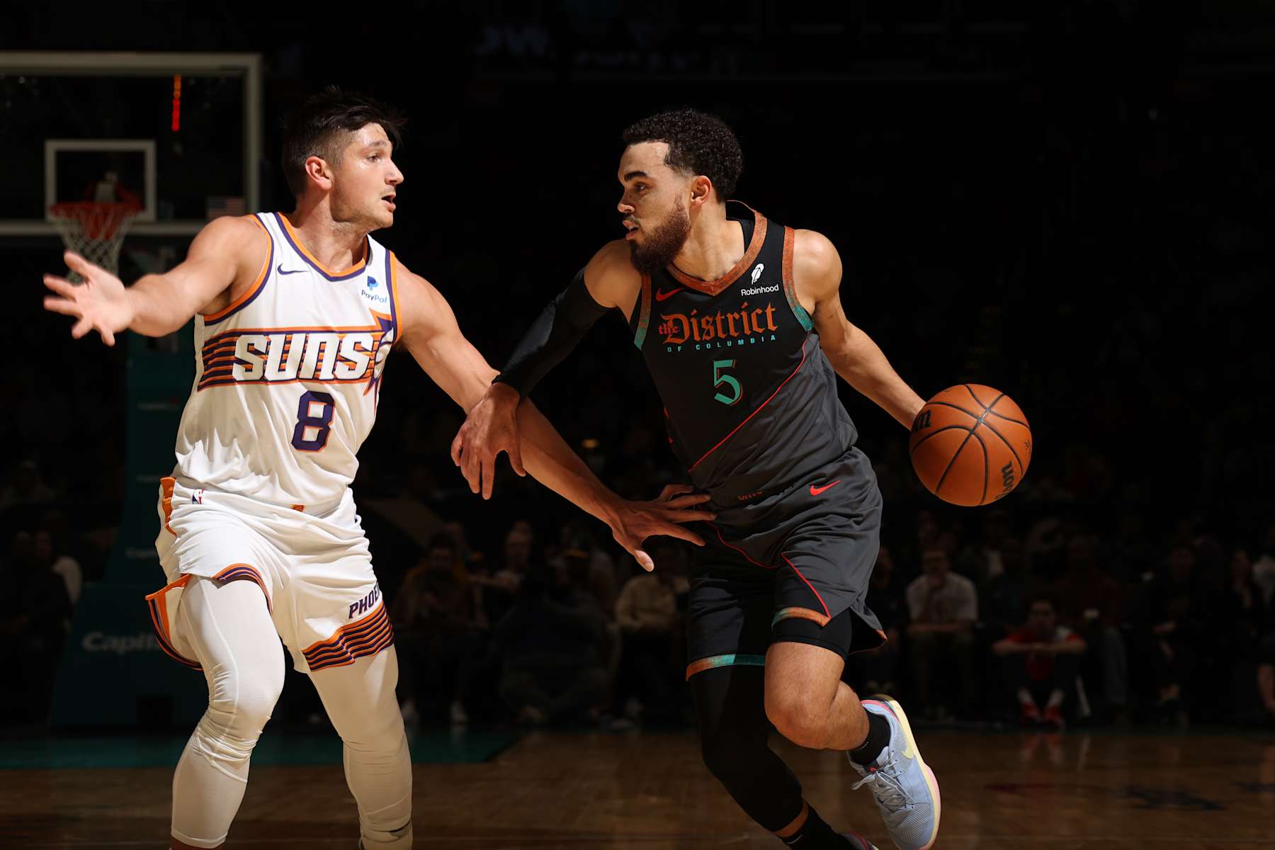 WASHINGTON, DC -  FEBRUARY 4: Tyus Jones #5 of the Washington Wizards handles the ball during the game against the Phoenix Suns on February 4, 2024 at Capital One Arena in Washington, DC. NOTE TO USER: User expressly acknowledges and agrees that, by downloading and or using this Photograph, user is consenting to the terms and conditions of the Getty Images License Agreement. Mandatory Copyright Notice: Copyright 2024 NBAE (Photo by Stephen Gosling/NBAE via Getty Images)