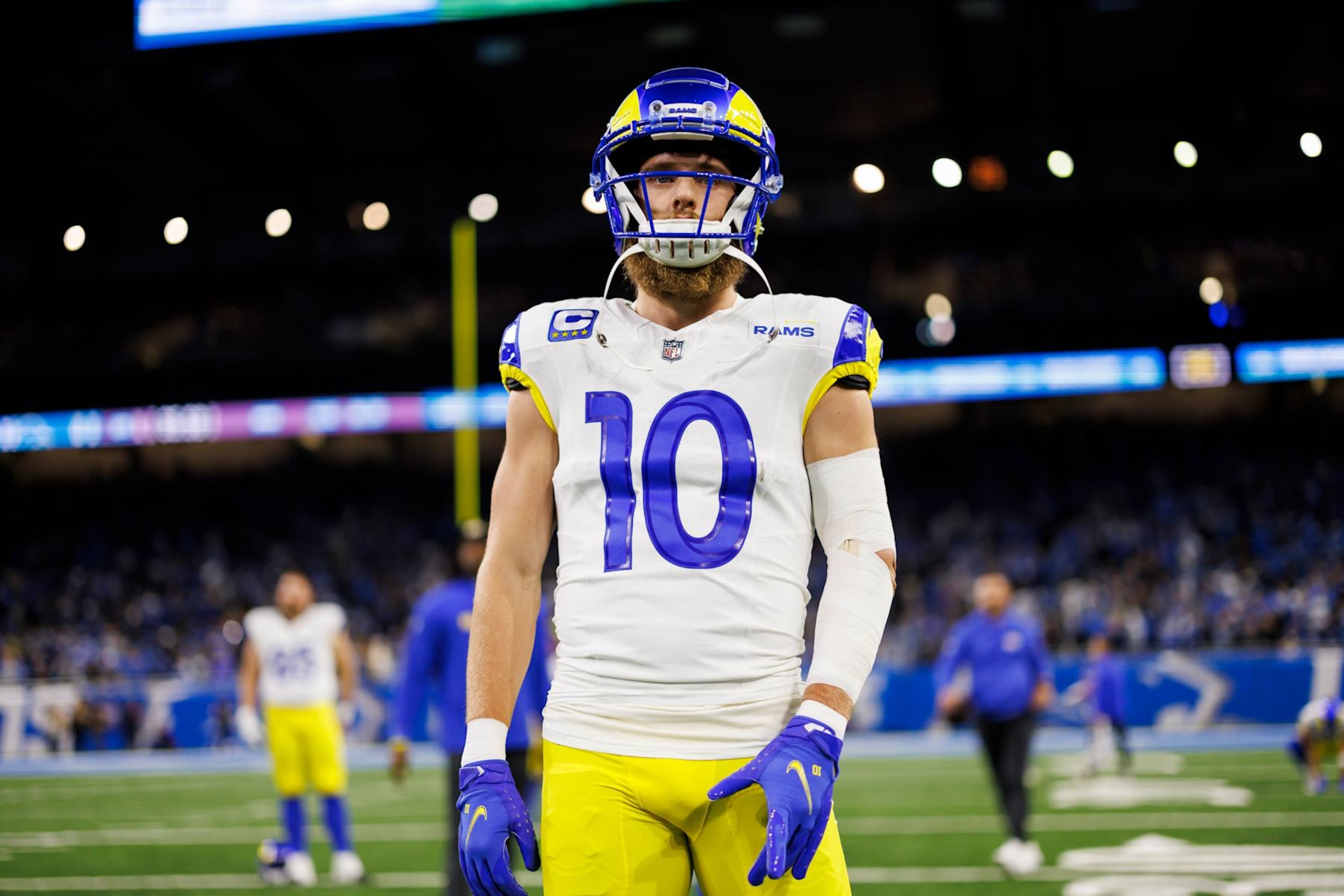 DETROIT, MICHIGAN - JANUARY 14: Cooper Kupp #10 of the Los Angeles Rams looks on during pregame warmups prior to an NFC Wild Card Playoff football game against the Detroit Lions at Ford Field on January 14, 2024 in Detroit, Michigan. (Photo by Ryan Kang/Getty Images)