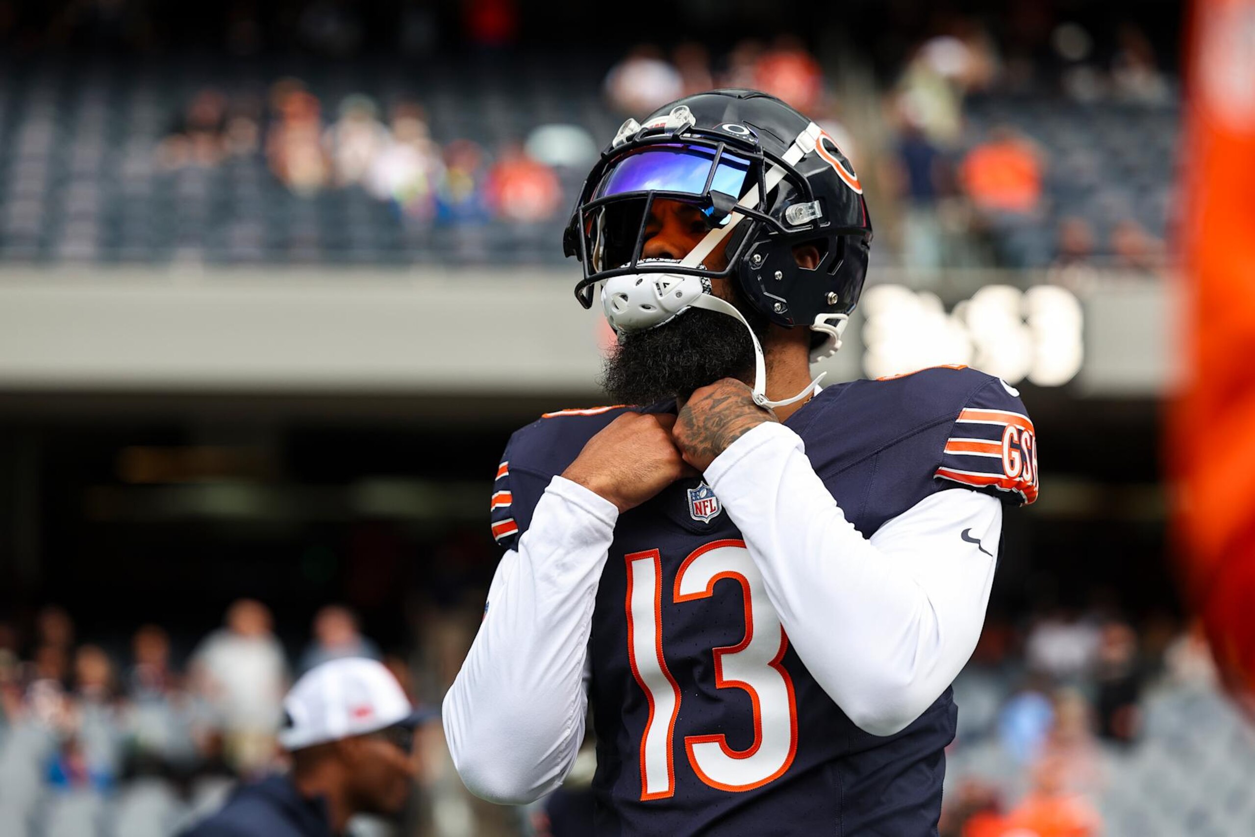 CHICAGO, IL - AUGUST 17: Keenan Allen #13 of the Chicago Bears warms up prior to an NFL football game against the Cincinnati Bengals at Solider Field on August 17, 2024 in Chicago, Illinois. (Photo by Perry Knotts/Getty Images)