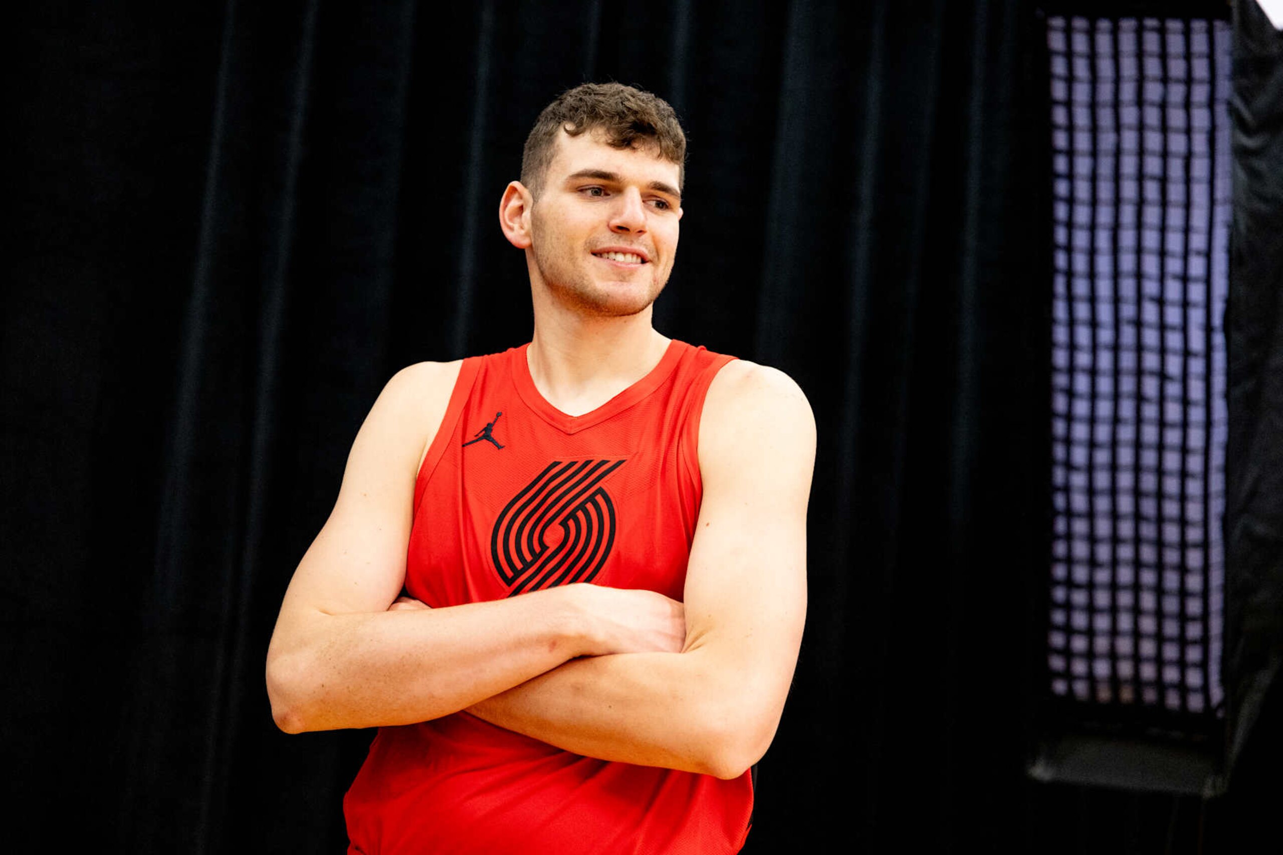 LAS VEGAS, NV - JULY 17: A behind the scenes look as Donovan Clingan #23 of the Portland Trail Blazers poses for a portrait during the 2024 NBA Rookie Photo Shoot on July 17, 2024 at the University of Nevada, Las Vegas campus in Las Vegas, Nevada. NOTE TO USER: User expressly acknowledges and agrees that, by downloading and/or using this Photograph, user is consenting to the terms and conditions of the Getty Images License Agreement. Mandatory Copyright Notice: Copyright 2024 NBAE (Photo by Dylan Goodman/NBAE via Getty Images)