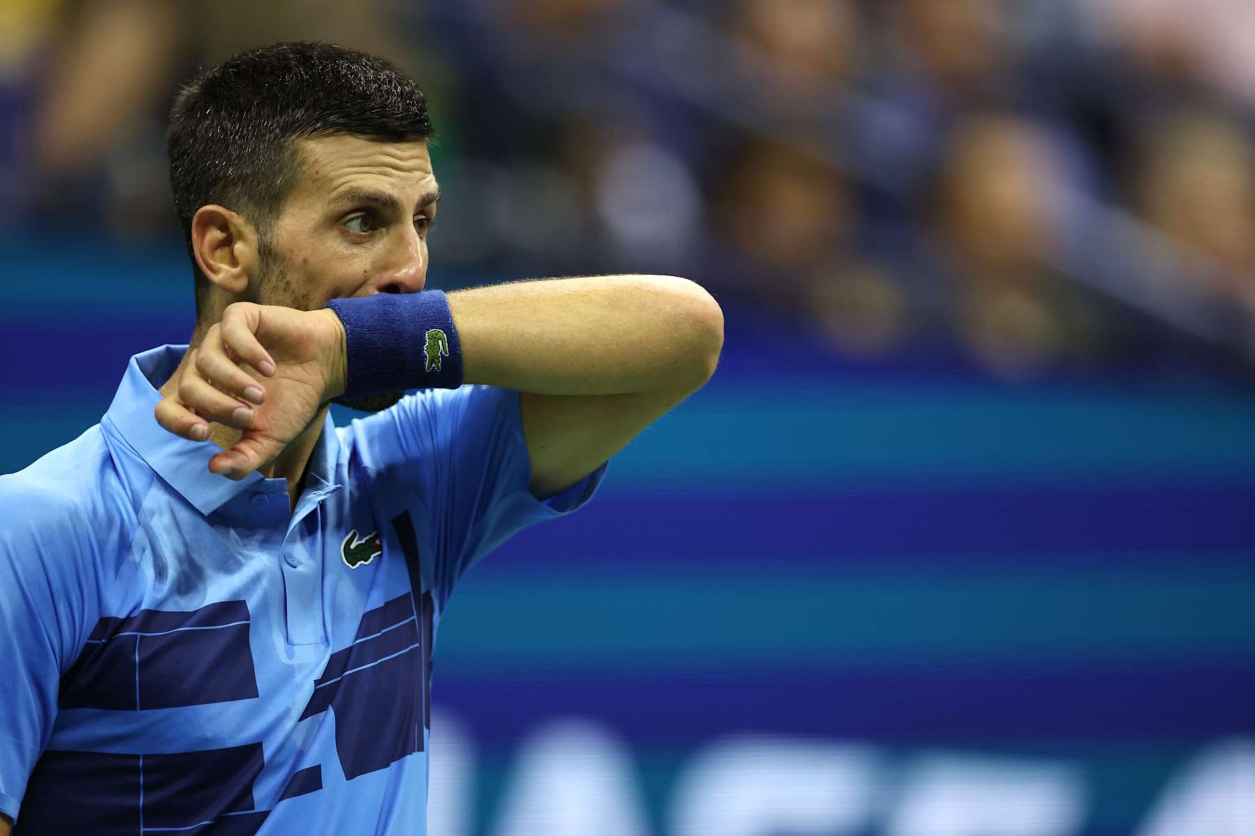 NEW YORK, NEW YORK - AUGUST 30: Novak Djokovic of Serbia reacts after a point against Alexei Popyrin of Australia during their Men's Singles Third Round match on Day Five of the 2024 US Open at USTA Billie Jean King National Tennis Center on August 30, 2024 in the Flushing neighborhood of the Queens borough of New York City. (Photo by Sarah Stier/Getty Images)