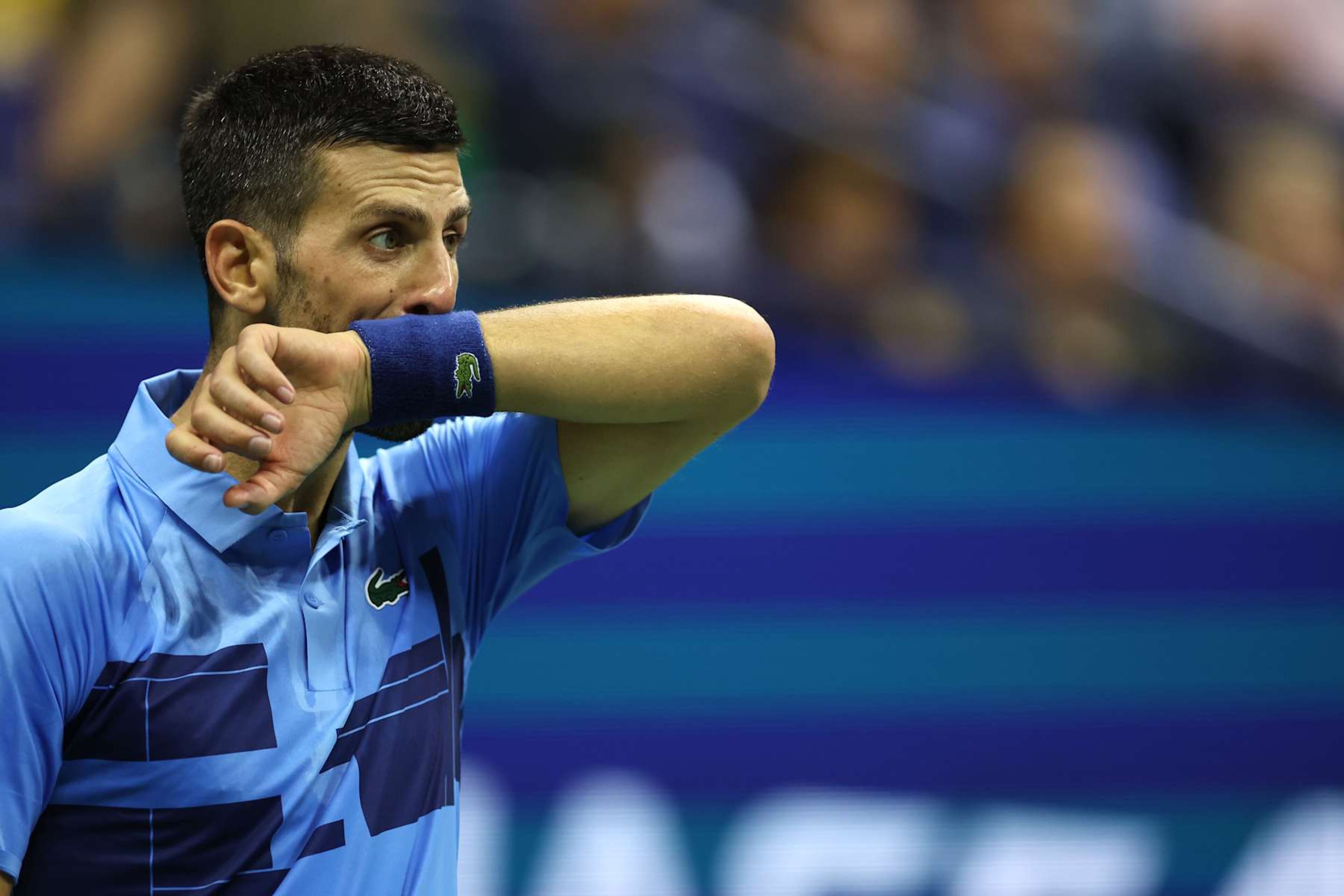 NEW YORK, NEW YORK - AUGUST 30: Novak Djokovic of Serbia reacts after a point against Alexei Popyrin of Australia during their Men's Singles Third Round match on Day Five of the 2024 US Open at USTA Billie Jean King National Tennis Center on August 30, 2024 in the Flushing neighborhood of the Queens borough of New York City. (Photo by Sarah Stier/Getty Images)