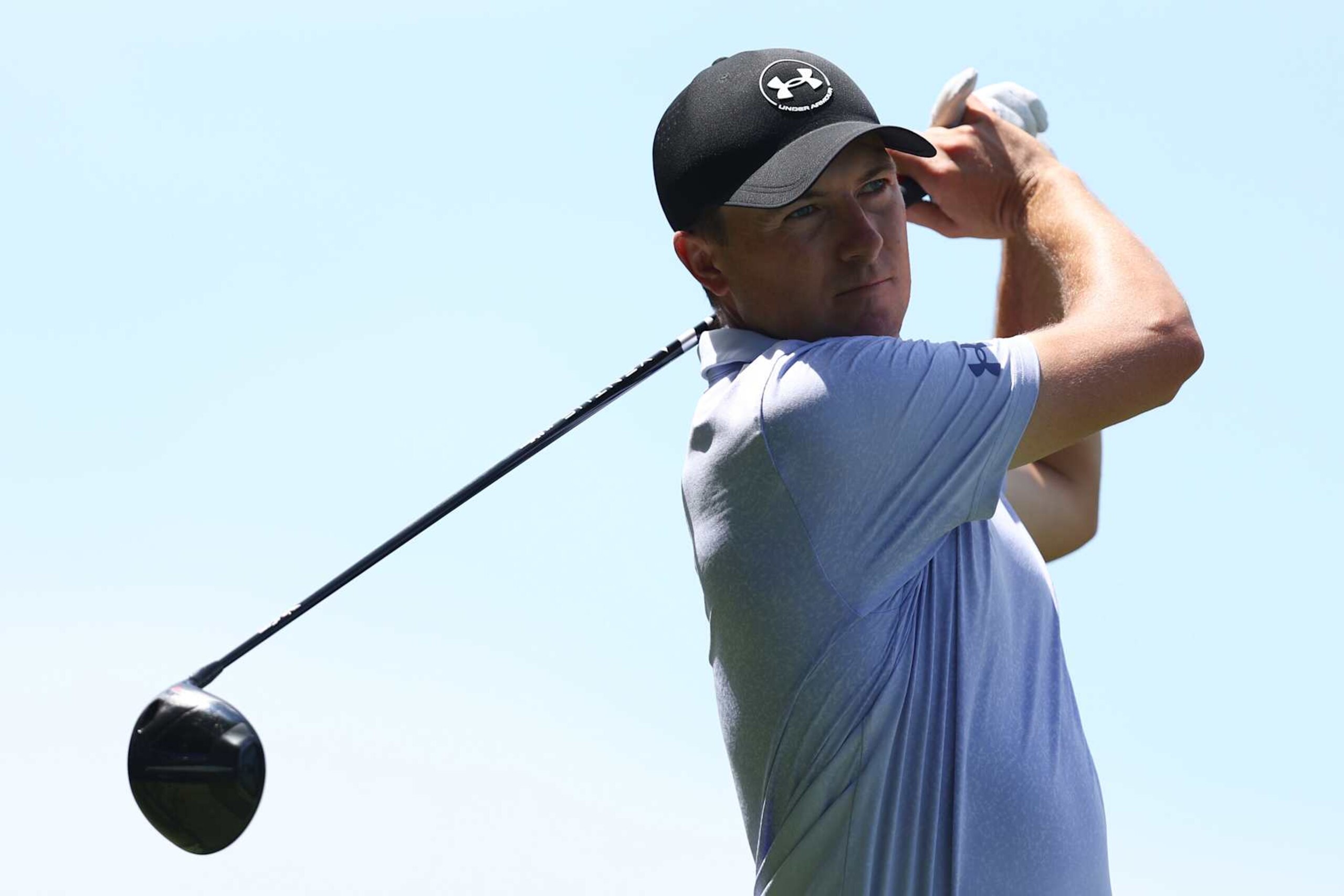 GREENSBORO, NORTH CAROLINA - AUGUST 09: Jordan Spieth of the United States plays his shot from the 15th tee during the first round of the Wyndham Championship at Sedgefield Country Club on August 09, 2024 in Greensboro, North Carolina. (Photo by David Jensen/Getty Images)