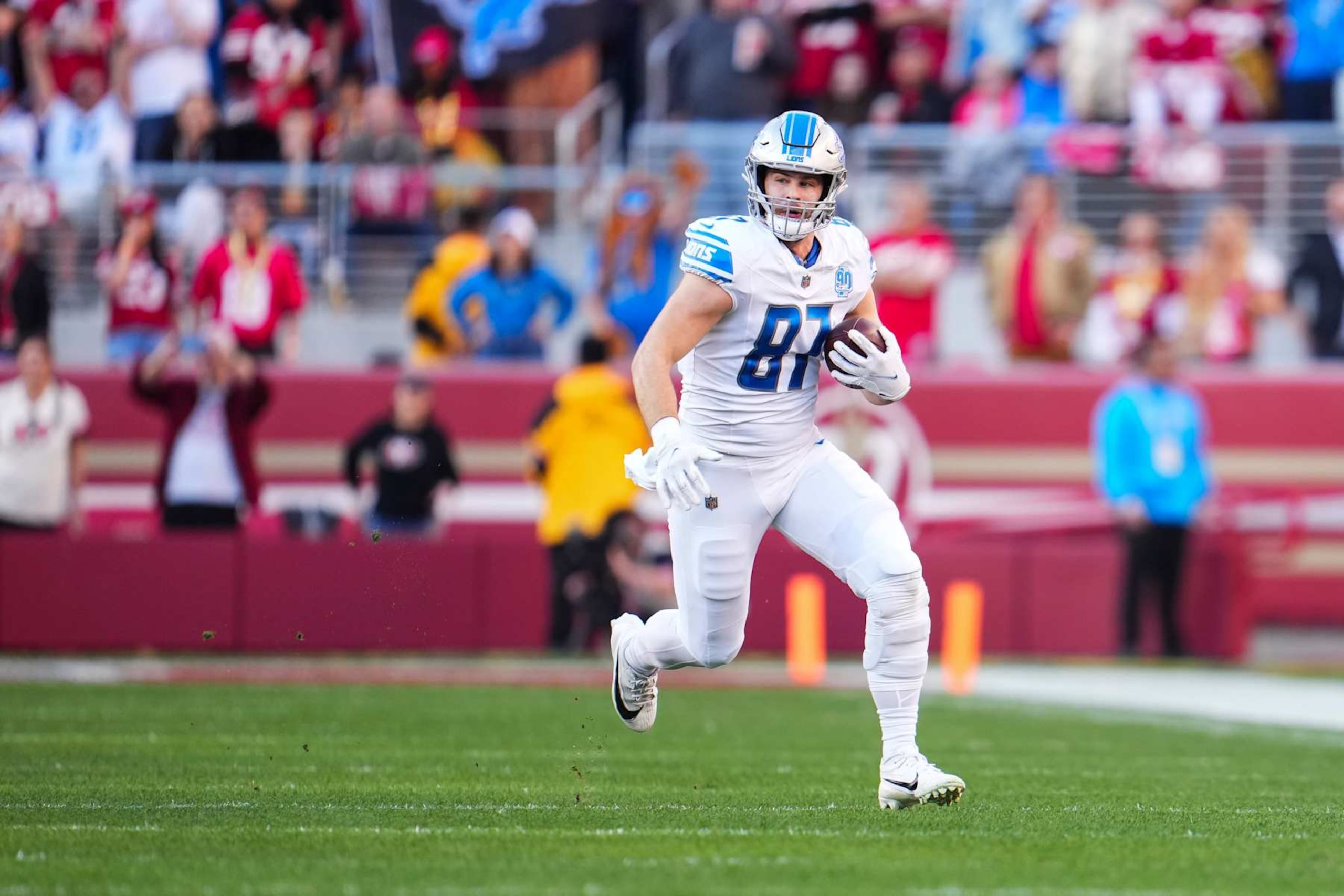 SANTA CLARA, CA - JANUARY 28: Sam LaPorta #87 of the Detroit Lions runs the ball during the NFC Championship NFL football game against the San Francisco 49ers at Levi's Stadium on January 28, 2024 in Santa Clara, California. (Photo by Cooper Neill/Getty Images)