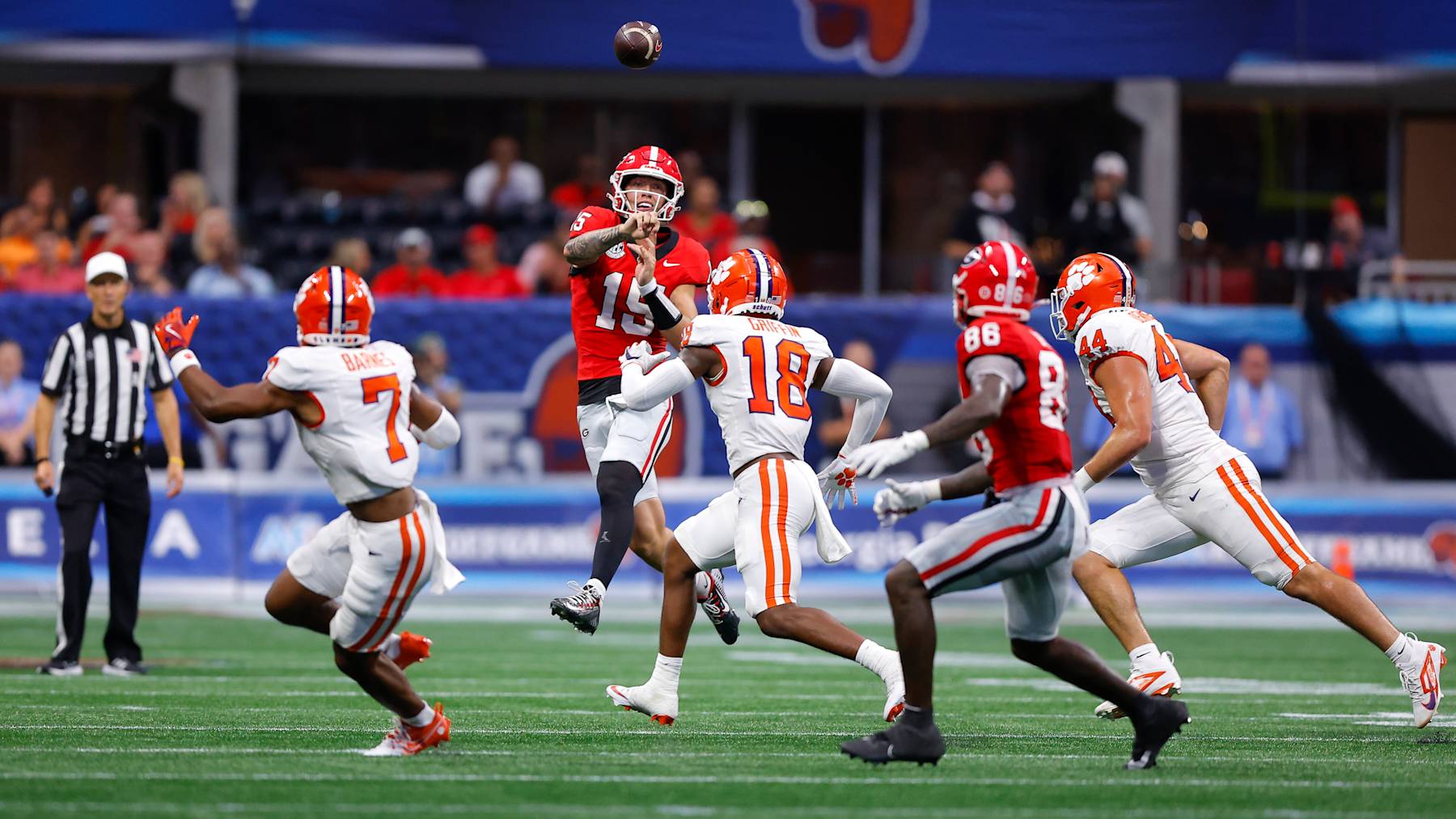 ATHENS, GEORGIA - AUGUST 31: Carson Beck #15 of the Georgia Bulldogs passes during the second quarter against the Clemson Tigers in the Aflac Kickoff Game at Mercedes-Benz Stadium on August 31, 2024 in Atlanta, Georgia.  (Photo by Todd Kirkland/Getty Images)