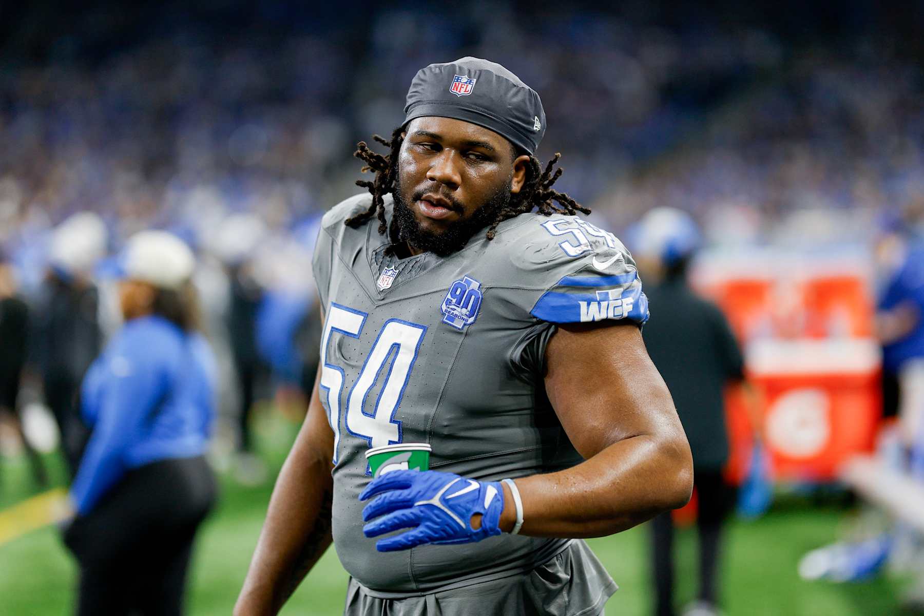 DETROIT, MICHIGAN - JANUARY 07: Alim McNeill #54 of the Detroit Lions talks with teammates during the second half of a game against the Minnesota Vikings at Ford Field on January 07, 2024 in Detroit, Michigan. (Photo by Mike Mulholland/Getty Images)