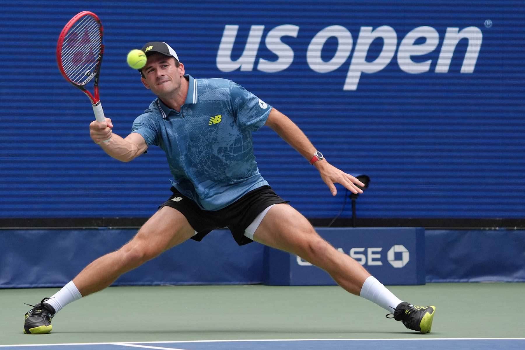 USA's Tommy Paul plays a return to Canada's Gabriel Diallo during their men's singles third round match on day six of the US Open tennis tournament at the USTA Billie Jean King National Tennis Center in New York City, on August 31, 2024. (Photo by TIMOTHY A. CLARY / AFP) (Photo by TIMOTHY A. CLARY/AFP via Getty Images)