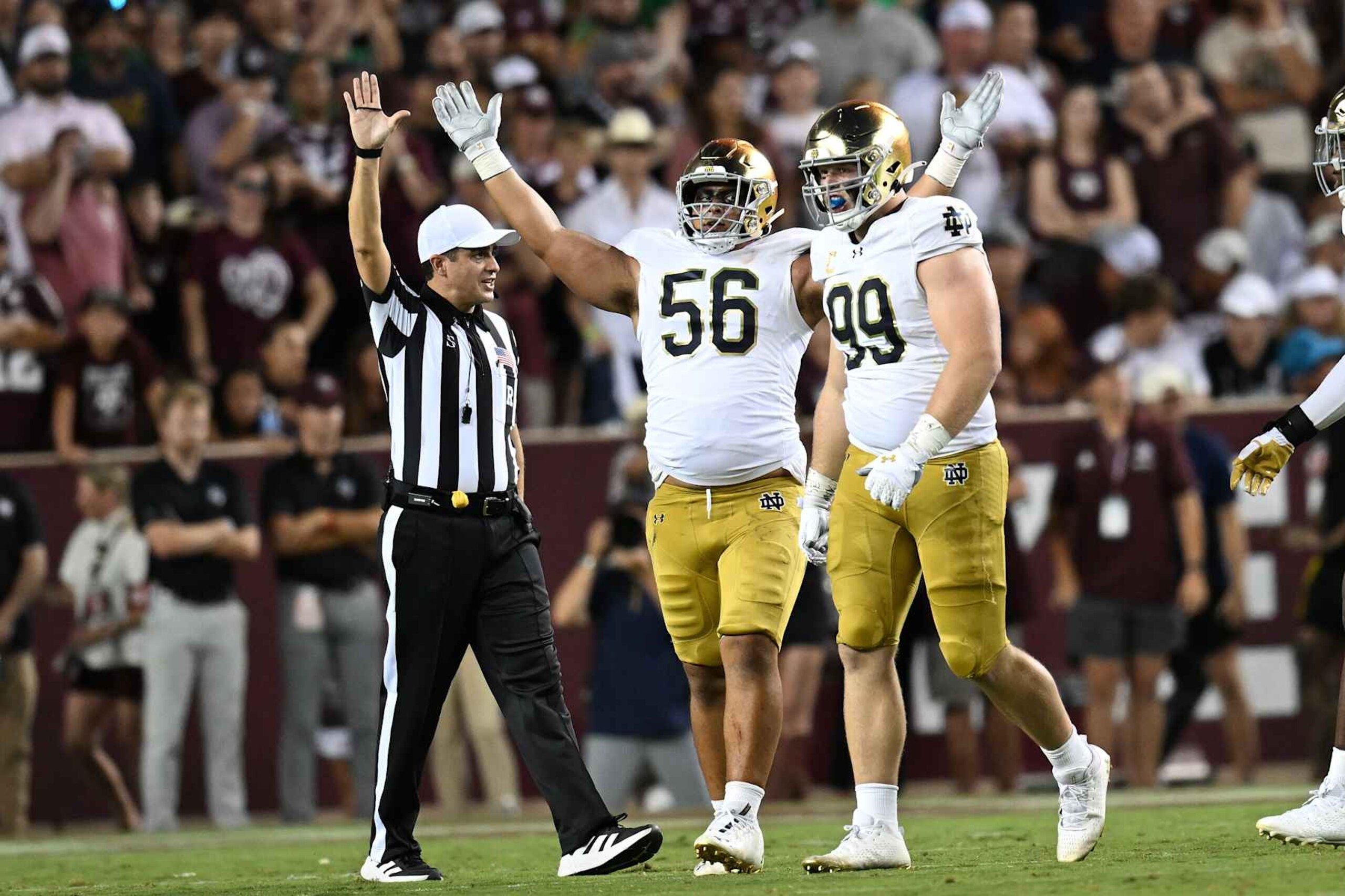 COLLEGE STATION, TEXAS - AUGUST 31: Howard Cross III #56 of the Notre Dame Fighting Irish celebrates his sack with Rylie Mills #99 against the Texas A&M Aggies at Kyle Field on August 31, 2024 in College Station, Texas. (Photo by Jack Gorman/Getty Images) COLLEGE STATION, TEXAS - AUGUST 31: Howard Cross III #56 of the Notre Dame Fighting Irish celebrates his sack with Rylie Mills #99 against the Texas A&M Aggies at Kyle Field on August 31, 2024 in College Station, Texas. (Photo by Jack Gorman/Getty Images)