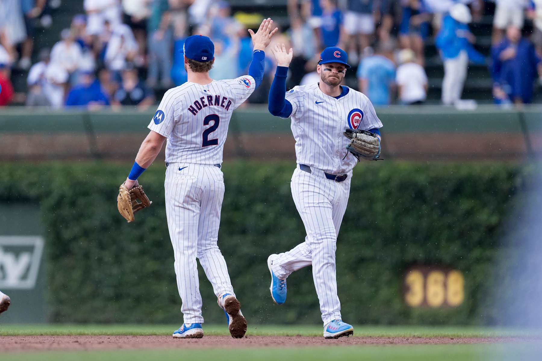 Nico Hoerner (L) and Ian Happ (R)