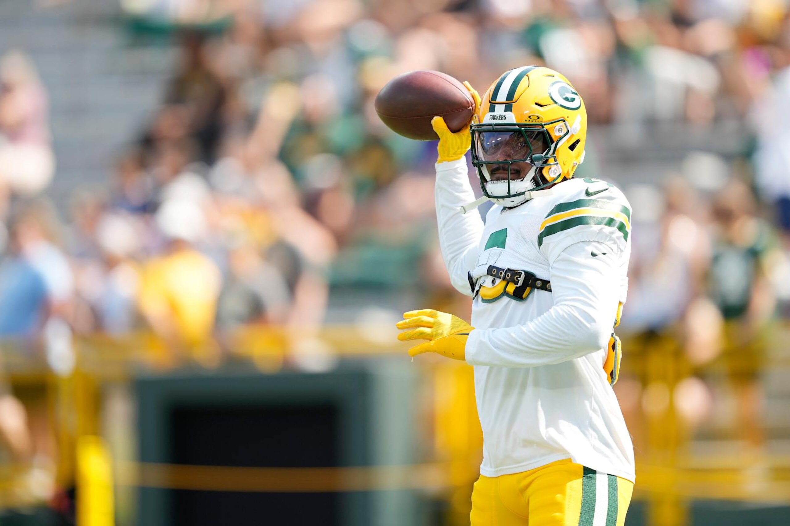 GREEN BAY, WISCONSIN - AUGUST 24: Josh Jacobs #8 of the Green Bay Packers warms up before a preseason game against the Baltimore Ravens at Lambeau Field on August 24, 2024 in Green Bay, Wisconsin. (Photo by Patrick McDermott/Getty Images)