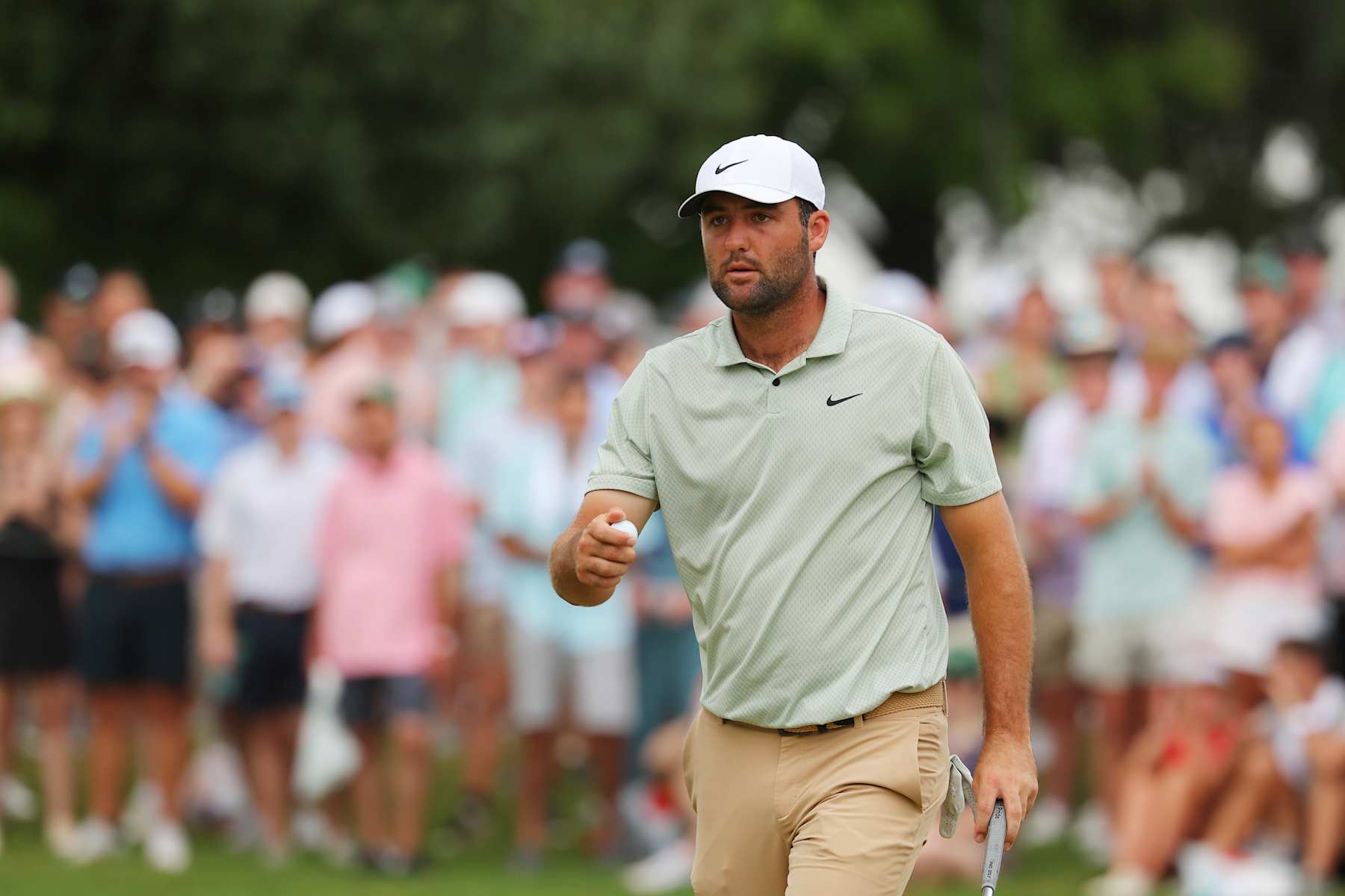 ATLANTA, GEORGIA - SEPTEMBER 01: Scottie Scheffler of the United States reacts on the 12th green during the final round of the TOUR Championship at East Lake Golf Club on September 01, 2024 in Atlanta, Georgia. (Photo by Kevin C. Cox/Getty Images)