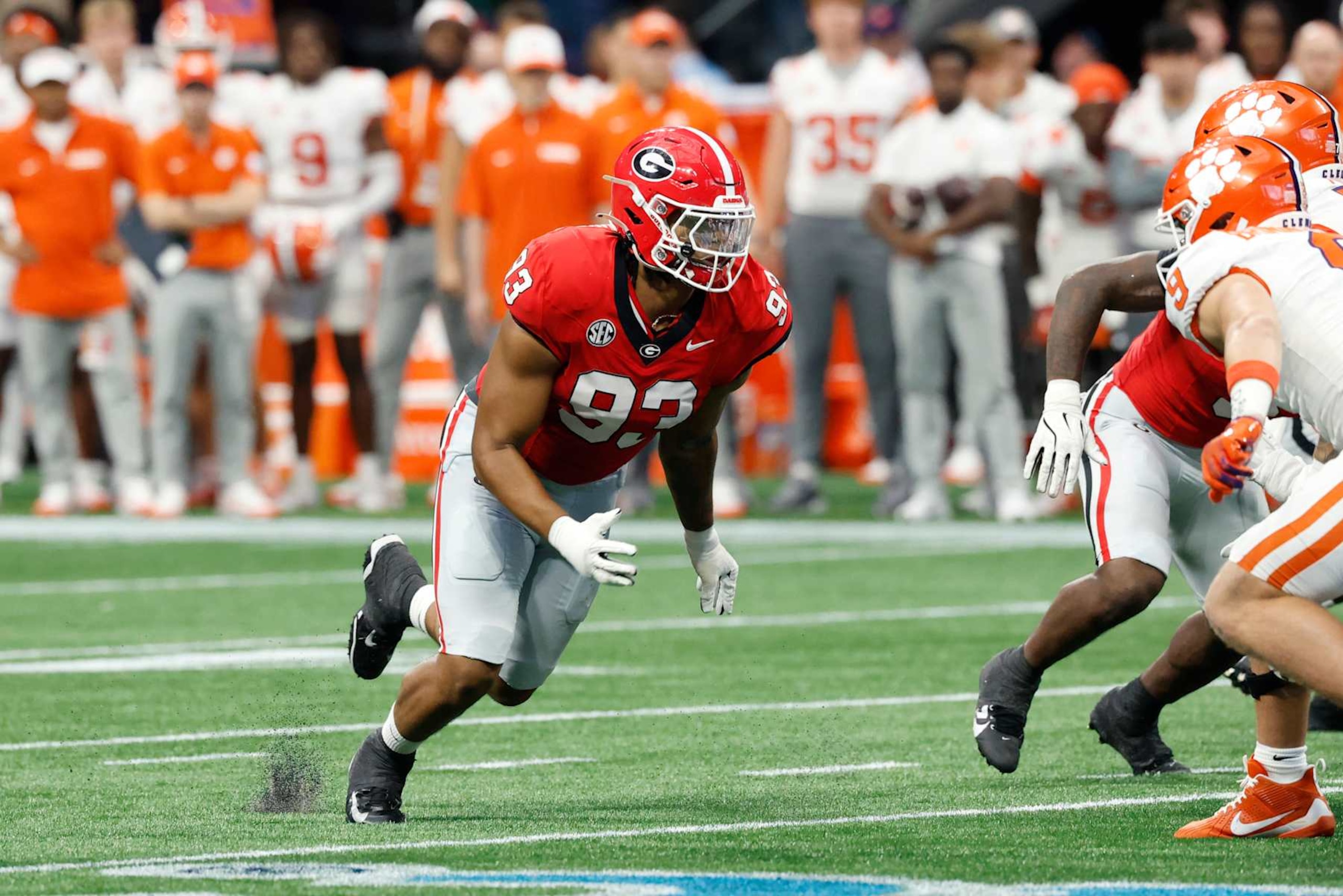 ATLANTA, GA - AUGUST 31: Georgia Bulldogs defensive lineman Tyrion Ingram-Dawkins (93) rushes on defense during the AFLAC Kickoff college football game against the Clemson Tigers on August 31, 2024 at Mercedes-Benz Stadium in Atlanta, Georgia. (Photo by Joe Robbins/Icon Sportswire via Getty Images) ATLANTA, GA - AUGUST 31: Georgia Bulldogs defensive lineman Tyrion Ingram-Dawkins (93) rushes on defense during the AFLAC Kickoff college football game against the Clemson Tigers on August 31, 2024 at Mercedes-Benz Stadium in Atlanta, Georgia. (Photo by Joe Robbins/Icon Sportswire via Getty Images)