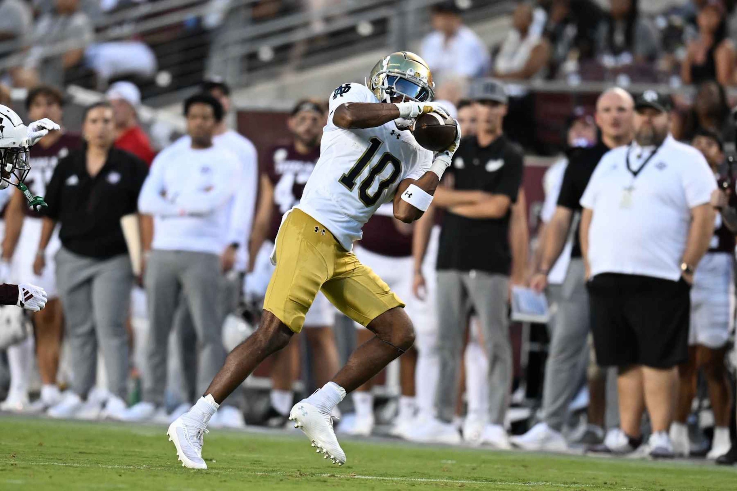 COLLEGE STATION, TEXAS - AUGUST 31: Kris Mitchell #10 of the Notre Dame Fighting Irish catches a pass against the Texas A&M Aggies during the second quarter at Kyle Field on August 31, 2024 in College Station, Texas. (Photo by Jack Gorman/Getty Images) COLLEGE STATION, TEXAS - AUGUST 31: Kris Mitchell #10 of the Notre Dame Fighting Irish catches a pass against the Texas A&M Aggies during the second quarter at Kyle Field on August 31, 2024 in College Station, Texas. (Photo by Jack Gorman/Getty Images)