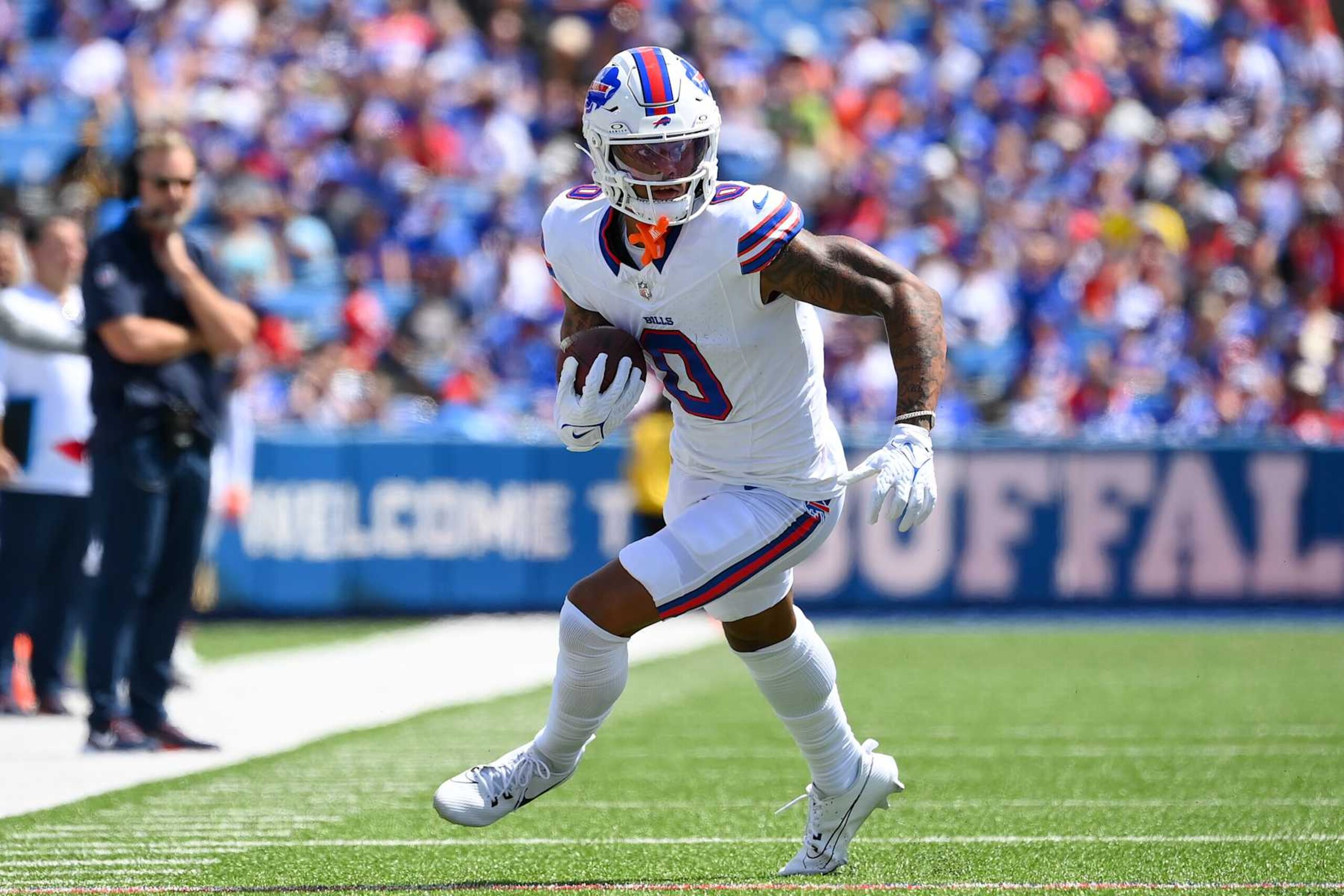 ORCHARD PARK, NEW YORK - AUGUST 10: Keon Coleman #0 of the Buffalo Bills runs with the ball after a catch against the Chicago Bears during the first half of a preseason game at Highmark Stadium on August 10, 2024 in Orchard Park, New York. The Bears won 33-6. (Photo by Rich Barnes/Getty Images)