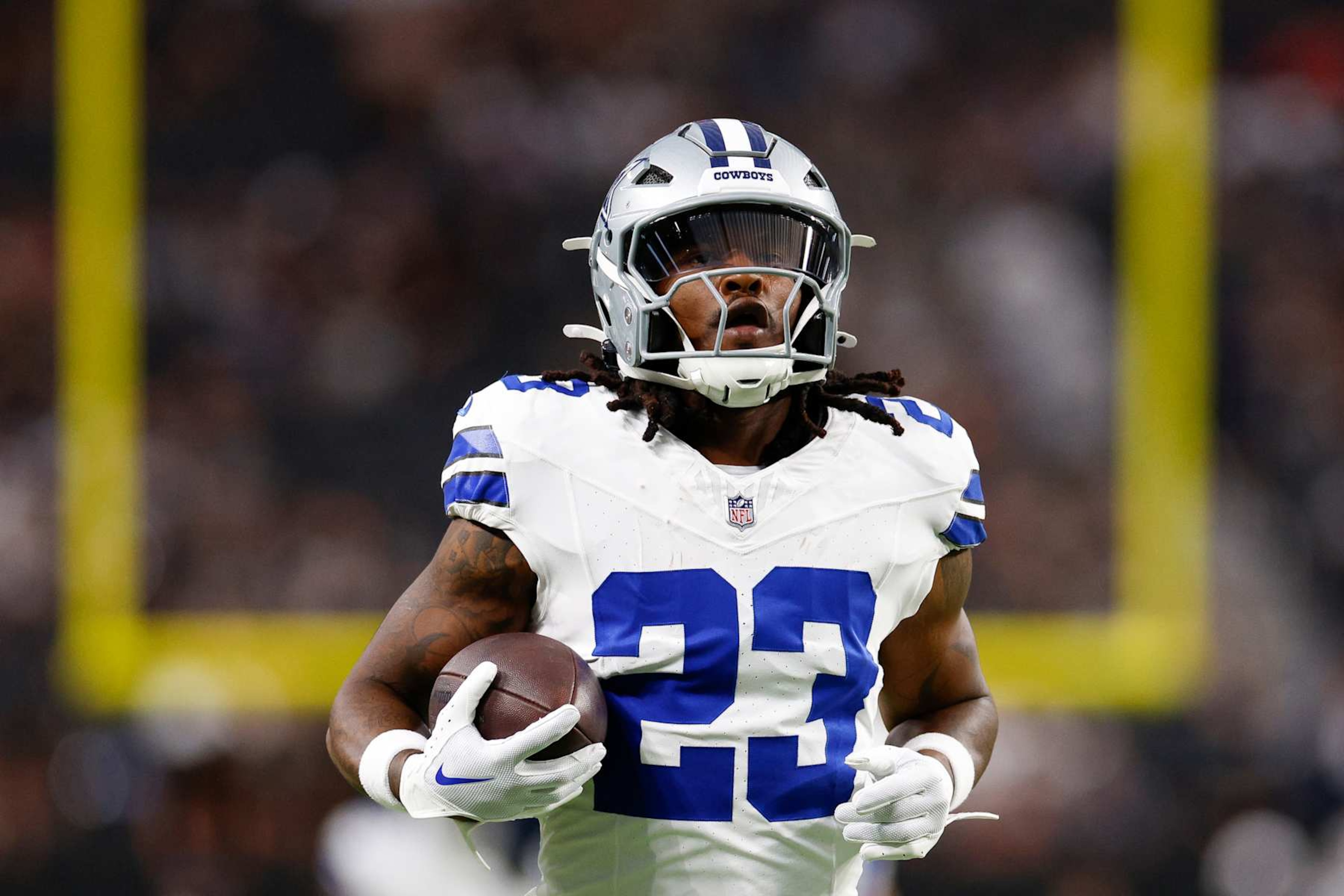 LAS VEGAS, NEVADA - AUGUST 17: Rico Dowdle #23 of the Dallas Cowboys warms up prior to a preseason game against the Las Vegas Raiders at Allegiant Stadium on August 17, 2024 in Las Vegas, Nevada. (Photo by Brandon Sloter/Getty Images)