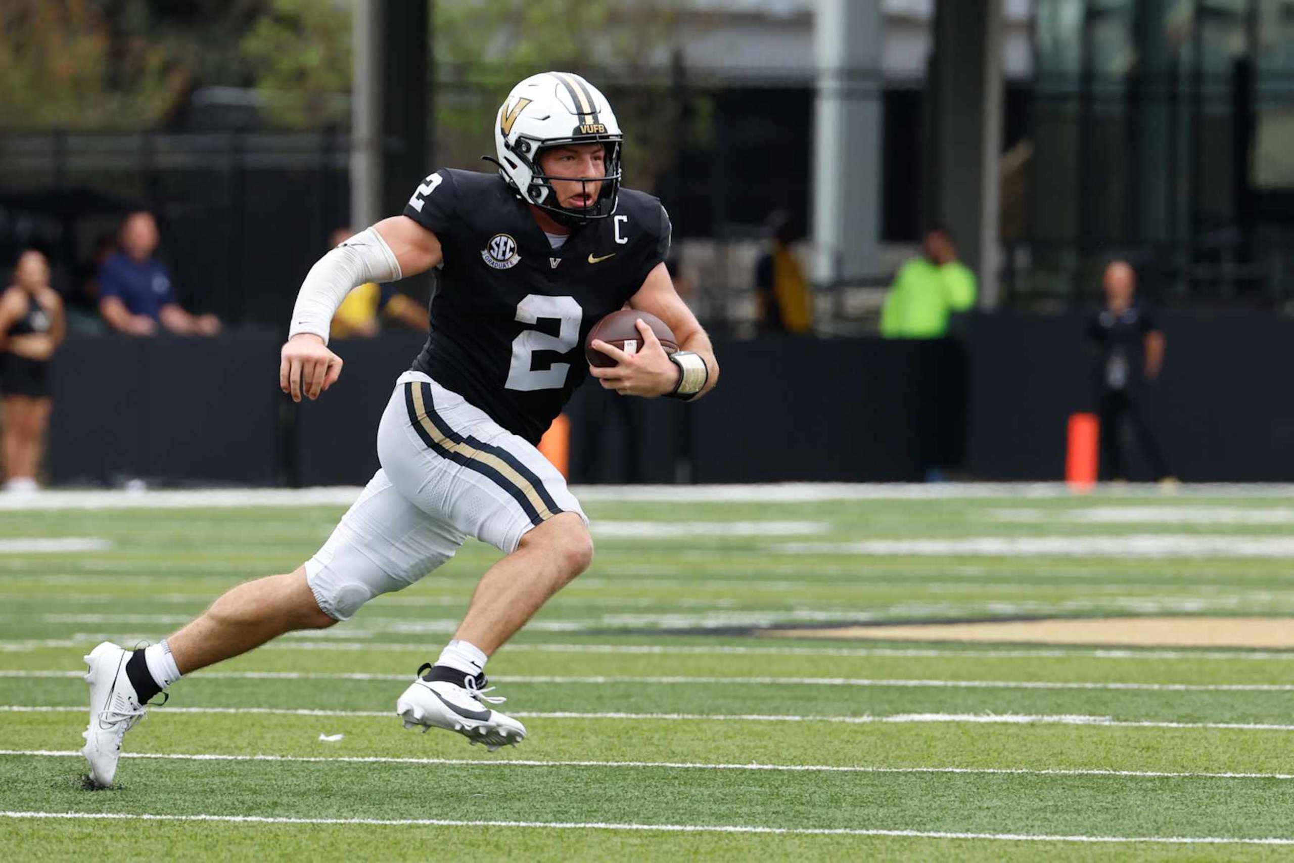 NASHVILLE, TN - AUGUST 31: Vanderbilt Commodores quarterback Diego Pavia (2) scrambles during a game between the Vanderbilt Commodores and Virginia Tech Hokies, August 31, 2024 at FirstBank Stadium in Nashville, Tennessee. (Photo by Matthew Maxey/Icon Sportswire via Getty Images)