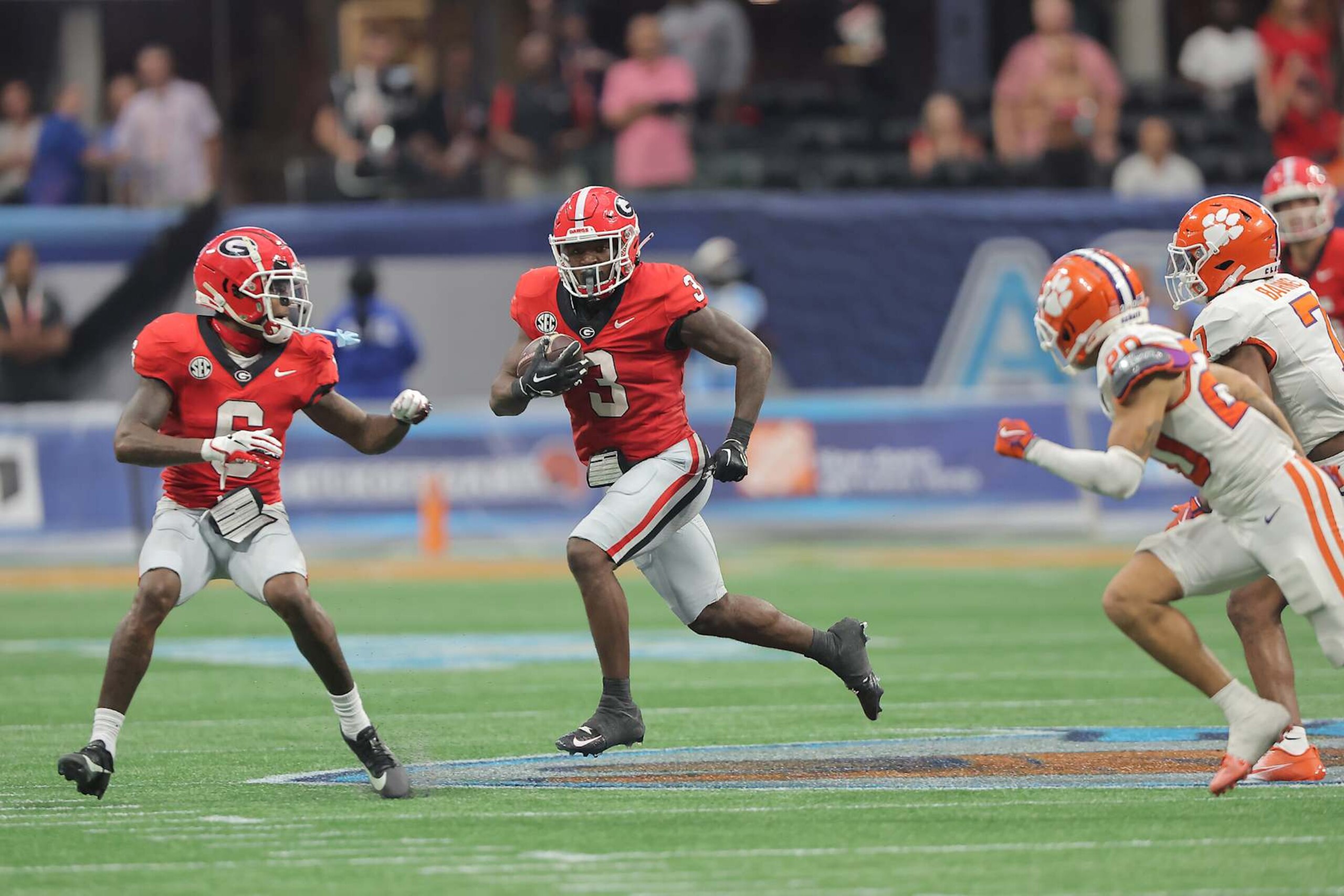 ATLANTA, GA - AUGUST 31: Georgia Bulldogs running back Nate Frazier (3) looks for an opening along the sidelines during the Saturday afternoon college football game between the University of Georgia Bulldogs and the Clemson Tigers on 08/31/2024 at the Mercedes-Benz Stadium in Atlanta, GA.  (Photo by David J. Griffin/Icon Sportswire via Getty Images)