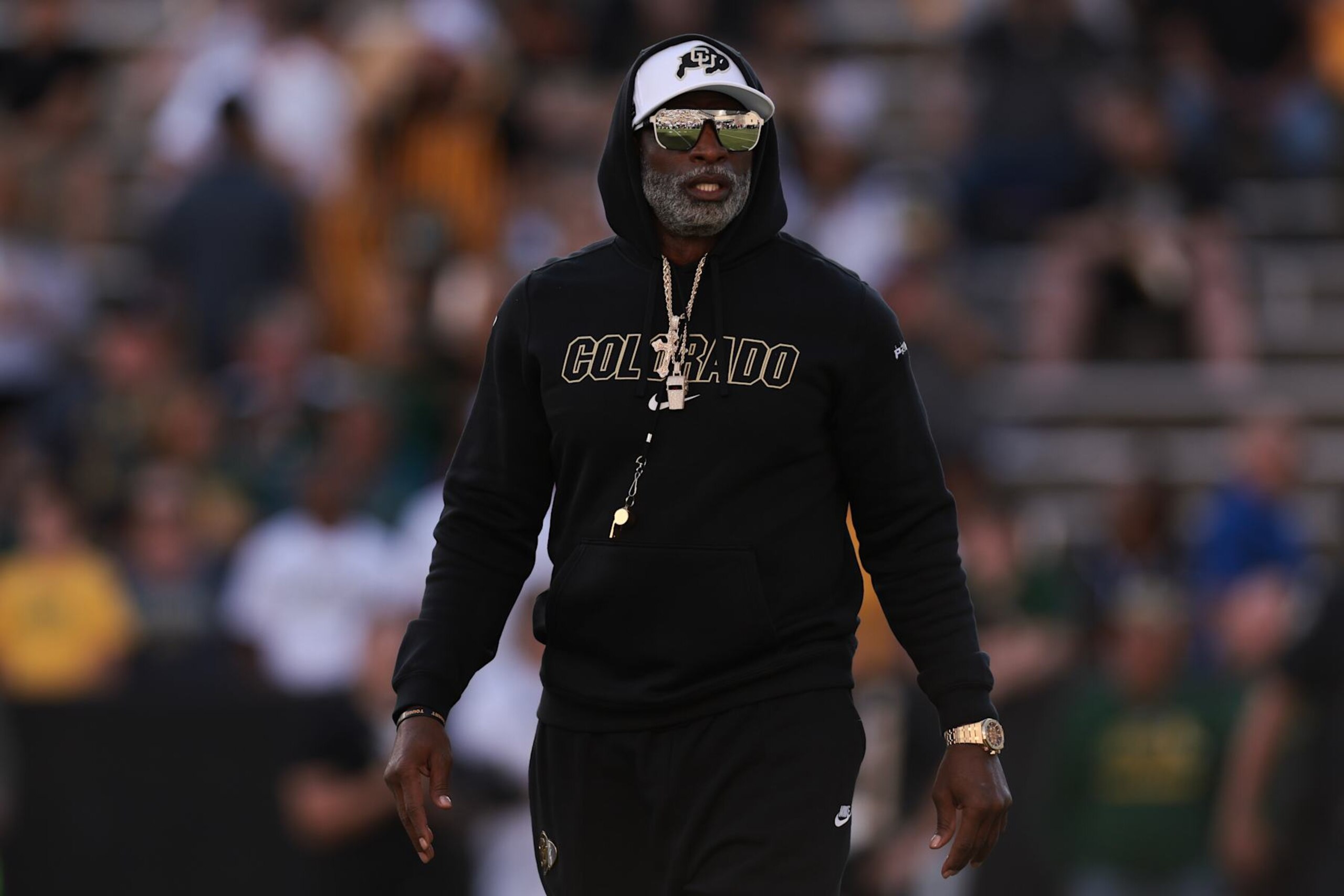 BOULDER, COLORADO - AUGUST 29: Head coach Deion Sanders of the Colorado Buffaloes walks the field during warm ups prior to the game against the North Dakota State Bison at Folsom Field on August 29, 2024 in Boulder, Colorado. (Photo by Andrew Wevers/Getty Images)