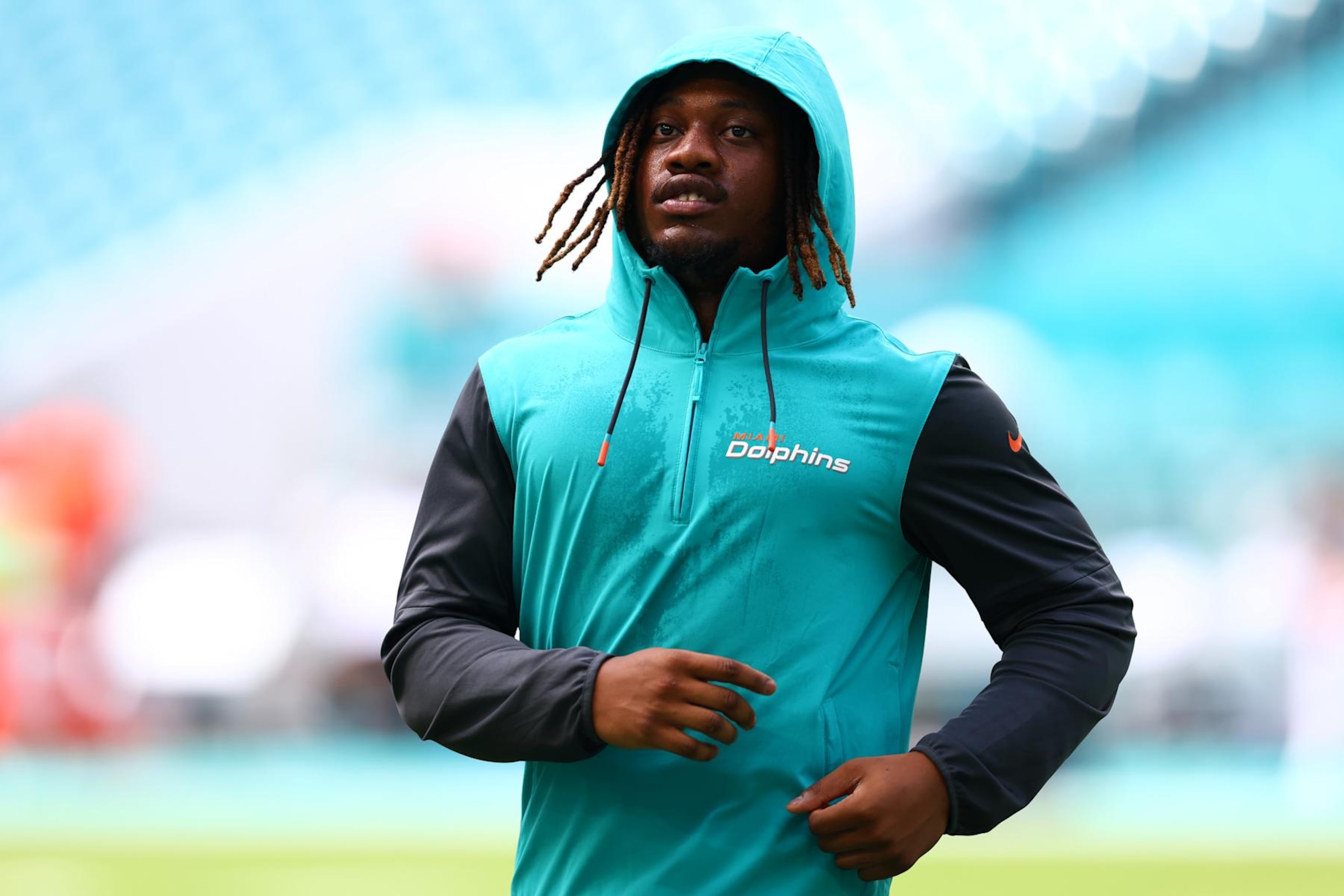 MIAMI GARDENS, FLORIDA - AUGUST 17: Jaylen Wright #25 of the Miami Dolphins warms up prior to a a preseason game against the Washington Commanders at Hard Rock Stadium on August 17, 2024 in Miami Gardens, Florida. (Photo by Megan Briggs/Getty Images)
