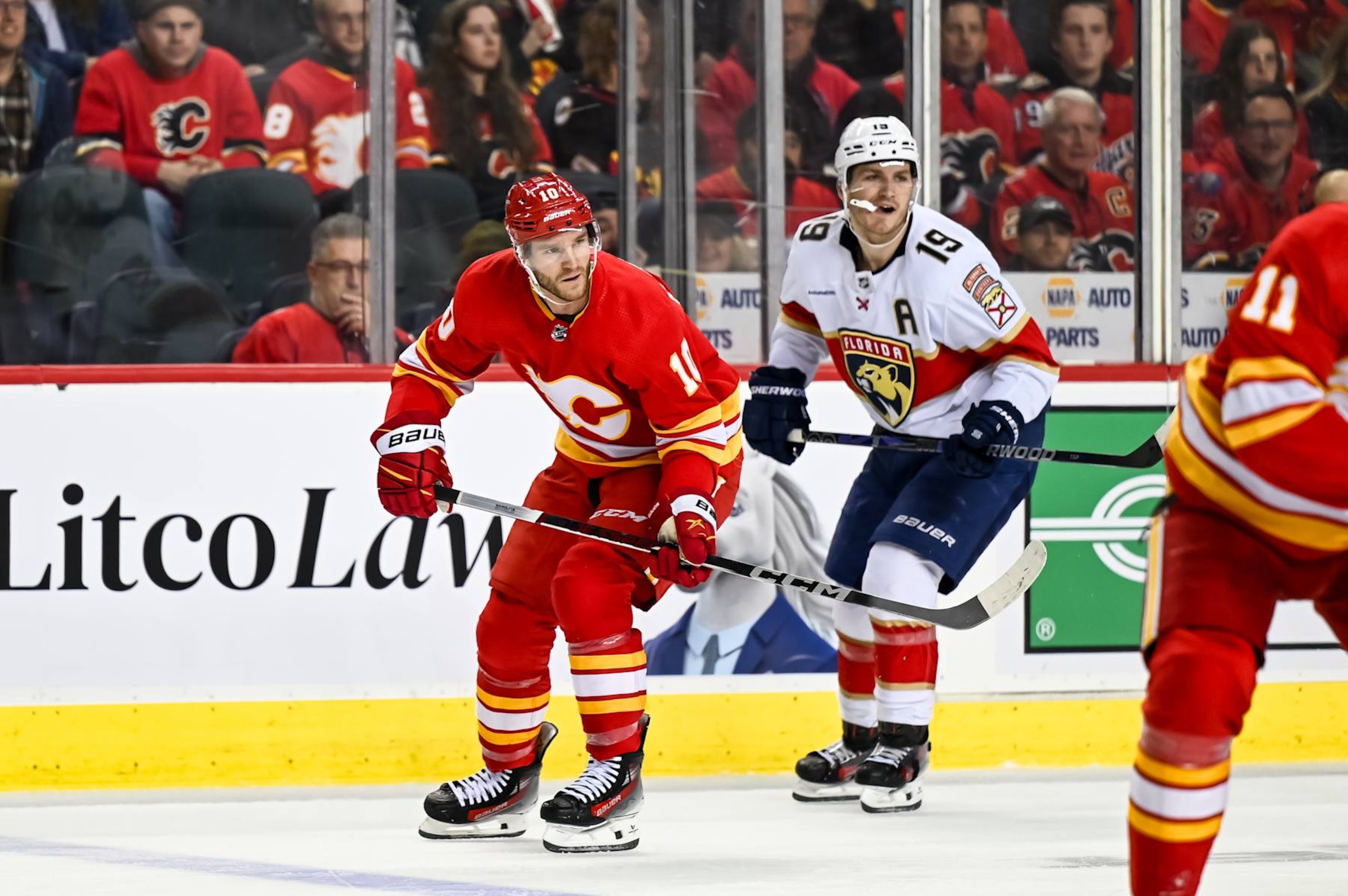 Florida Panthers winger Matthew Tkachuk (right) and Calgary Flames winger Jonathan Huberdeau. Florida Panthers winger Matthew Tkachuk (right) and Calgary Flames winger Jonathan Huberdeau.