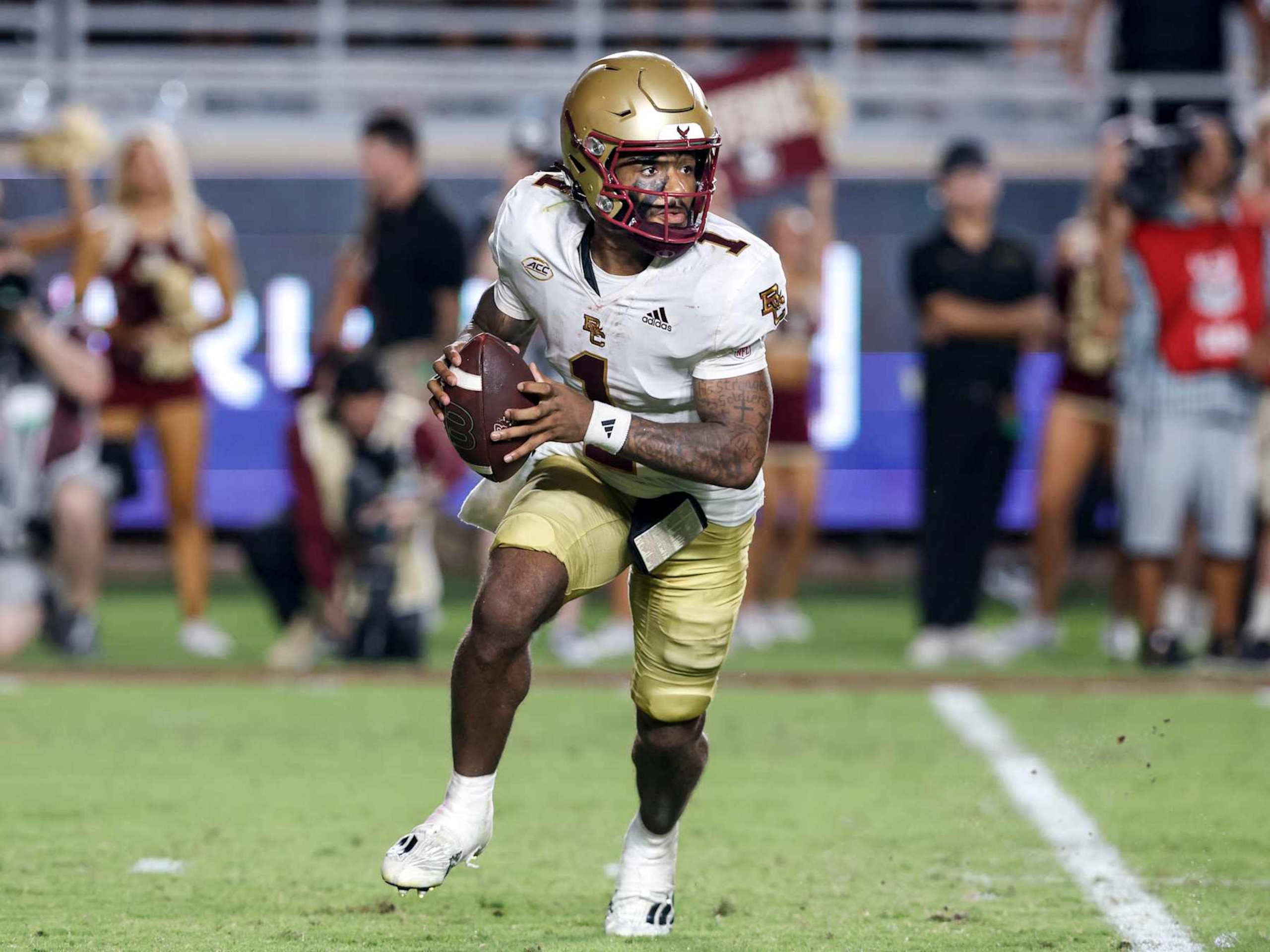 TALLAHASSEE, FL - SEPTEMBER 2: Thomas Castellanos #1 of the Boston College Eagles rolls out on a pass play during the game against the Florida State Seminoles at Doak Campbell Stadium on Bobby Bowden Field on September 2, 2024 in Tallahassee, Florida. The Eagles defeated the Seminoles 28-13. (Photo by Don Juan Moore/Getty Images) TALLAHASSEE, FL - SEPTEMBER 2: Thomas Castellanos #1 of the Boston College Eagles rolls out on a pass play during the game against the Florida State Seminoles at Doak Campbell Stadium on Bobby Bowden Field on September 2, 2024 in Tallahassee, Florida. The Eagles defeated the Seminoles 28-13. (Photo by Don Juan Moore/Getty Images)