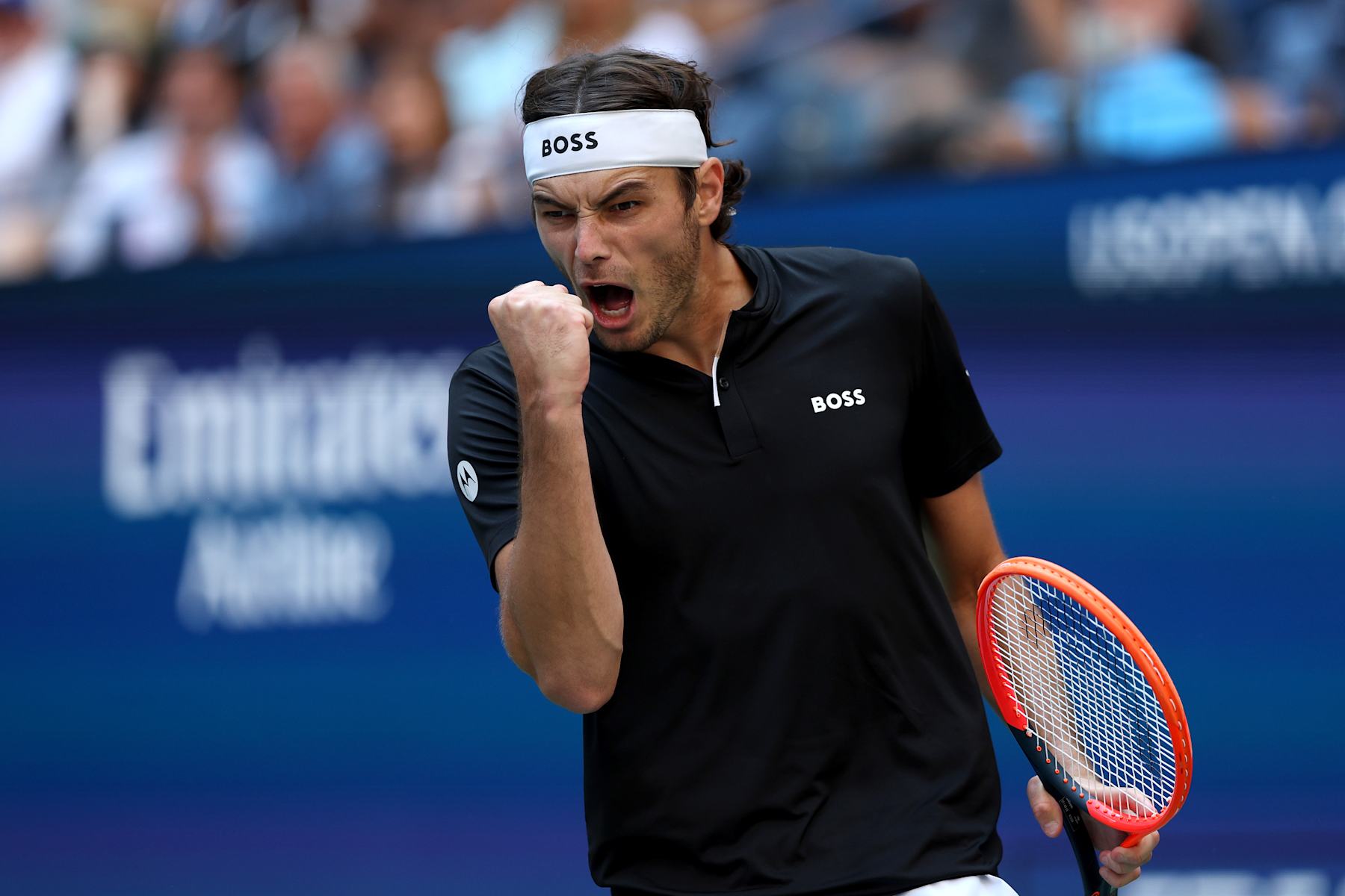 NEW YORK, NEW YORK - SEPTEMBER 03: Taylor Fritz of the United States celebrates a point against Alexander Zverev of Germany during their Men's Singles Quarterfinal match on Day Nine of the 2024 US Open at USTA Billie Jean King National Tennis Center on September 03, 2024 in the Flushing neighborhood of the Queens borough of New York City. (Photo by Jamie Squire/Getty Images)