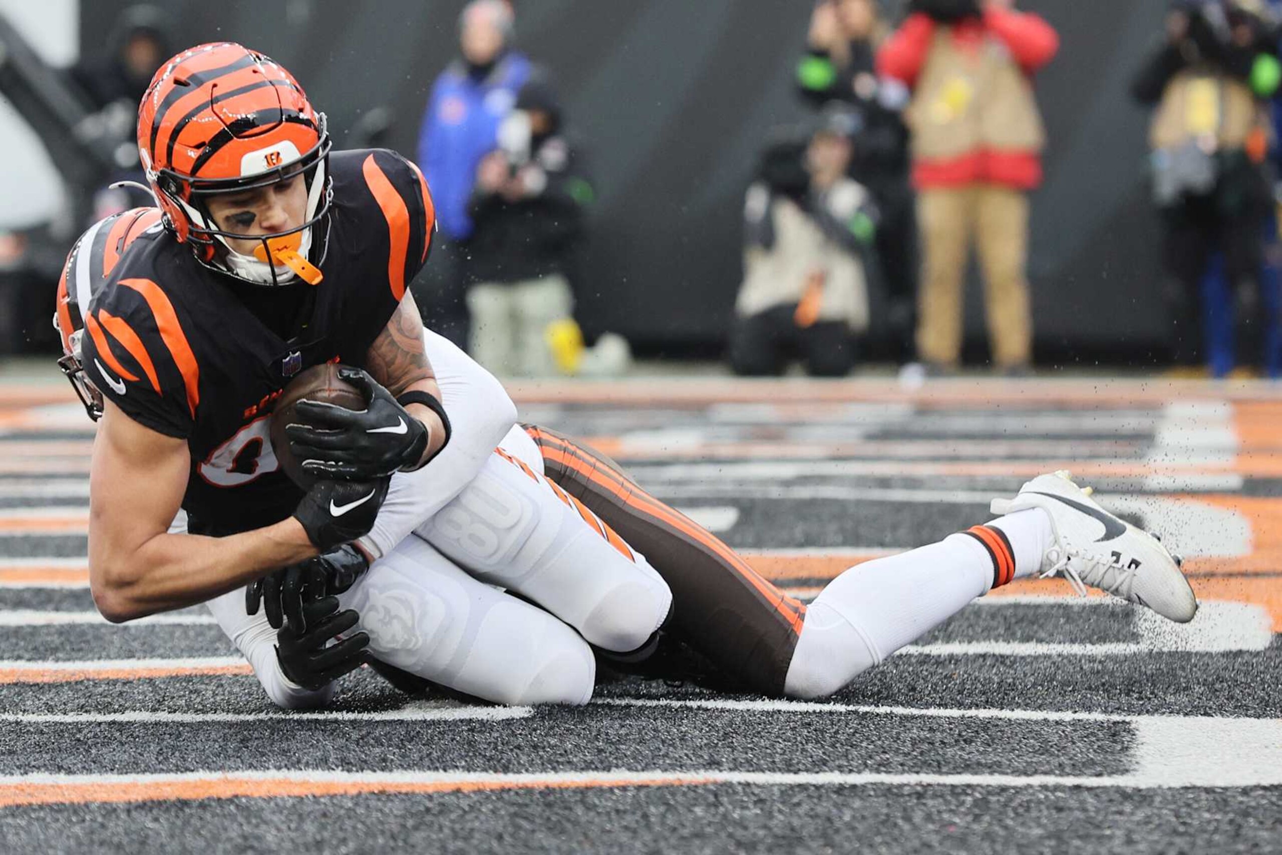 CINCINNATI, OHIO - JANUARY 07: Andrei Iosivas #80 of the Cincinnati Bengals scores a touchdown during the third quarter in the game against the Cleveland Browns at Paycor Stadium on January 07, 2024 in Cincinnati, Ohio. (Photo by Andy Lyons/Getty Images)