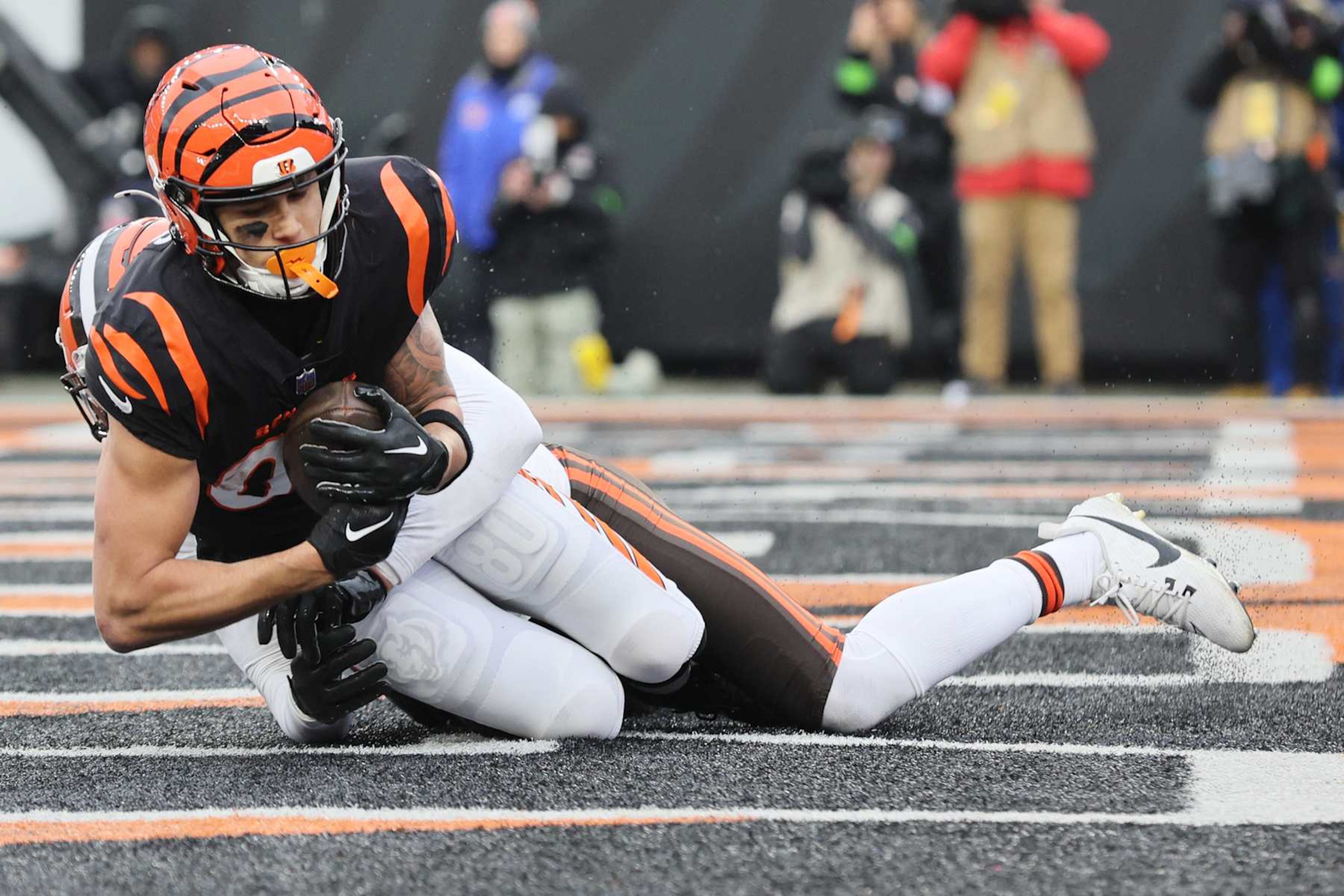CINCINNATI, OHIO - JANUARY 07: Andrei Iosivas #80 of the Cincinnati Bengals scores a touchdown during the third quarter in the game against the Cleveland Browns at Paycor Stadium on January 07, 2024 in Cincinnati, Ohio. (Photo by Andy Lyons/Getty Images)