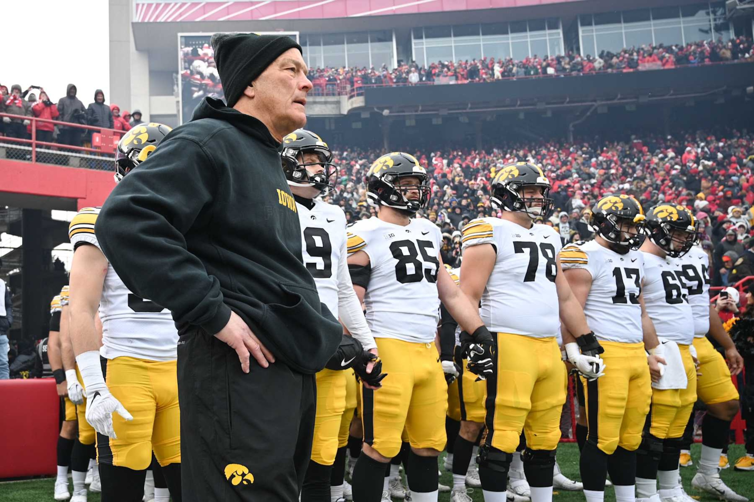 LINCOLN, NEBRASKA - NOVEMBER 24: Head coach Kirk Ferentz of the Iowa Hawkeyes waits with the team to take the field against the Nebraska Cornhuskers at Memorial Stadium on November 24, 2023 in Lincoln, Nebraska. (Photo by Steven Branscombe/Getty Images)