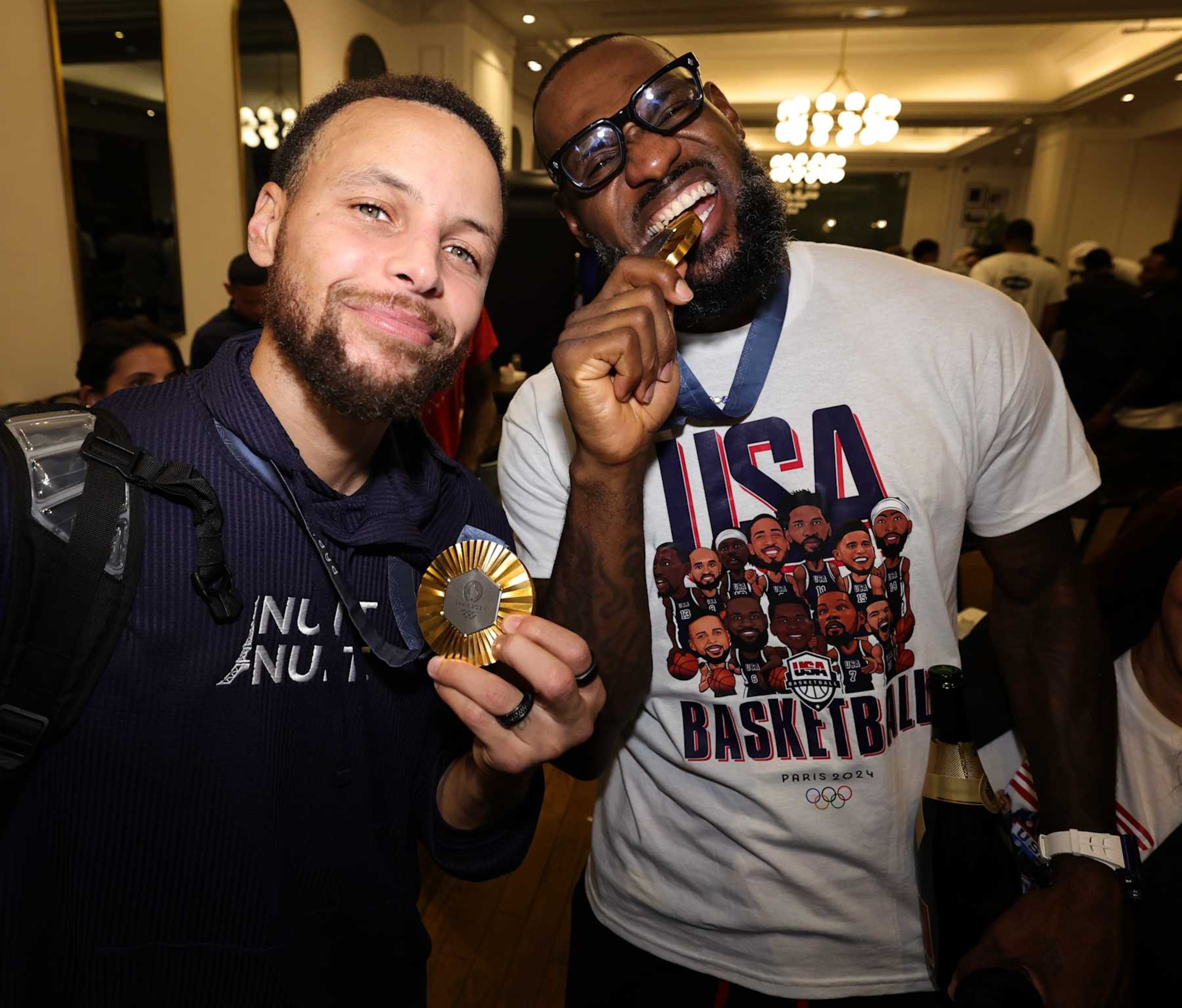 PARIS, FRANCE - AUGUST 10: Stephen Curry #4 and LeBron James #6 of the USA Men's National Team returns to the hotel after winning the Gold against France on August 10, 2024 in Paris, France. NOTE TO USER: User expressly acknowledges and agrees that, by downloading and/or using this photograph, user is consenting to the terms and conditions of the Getty Images License Agreement. Mandatory Copyright Notice: Copyright 2024 NBAE (Photo by Jim Poorten/NBAE via Getty Images)