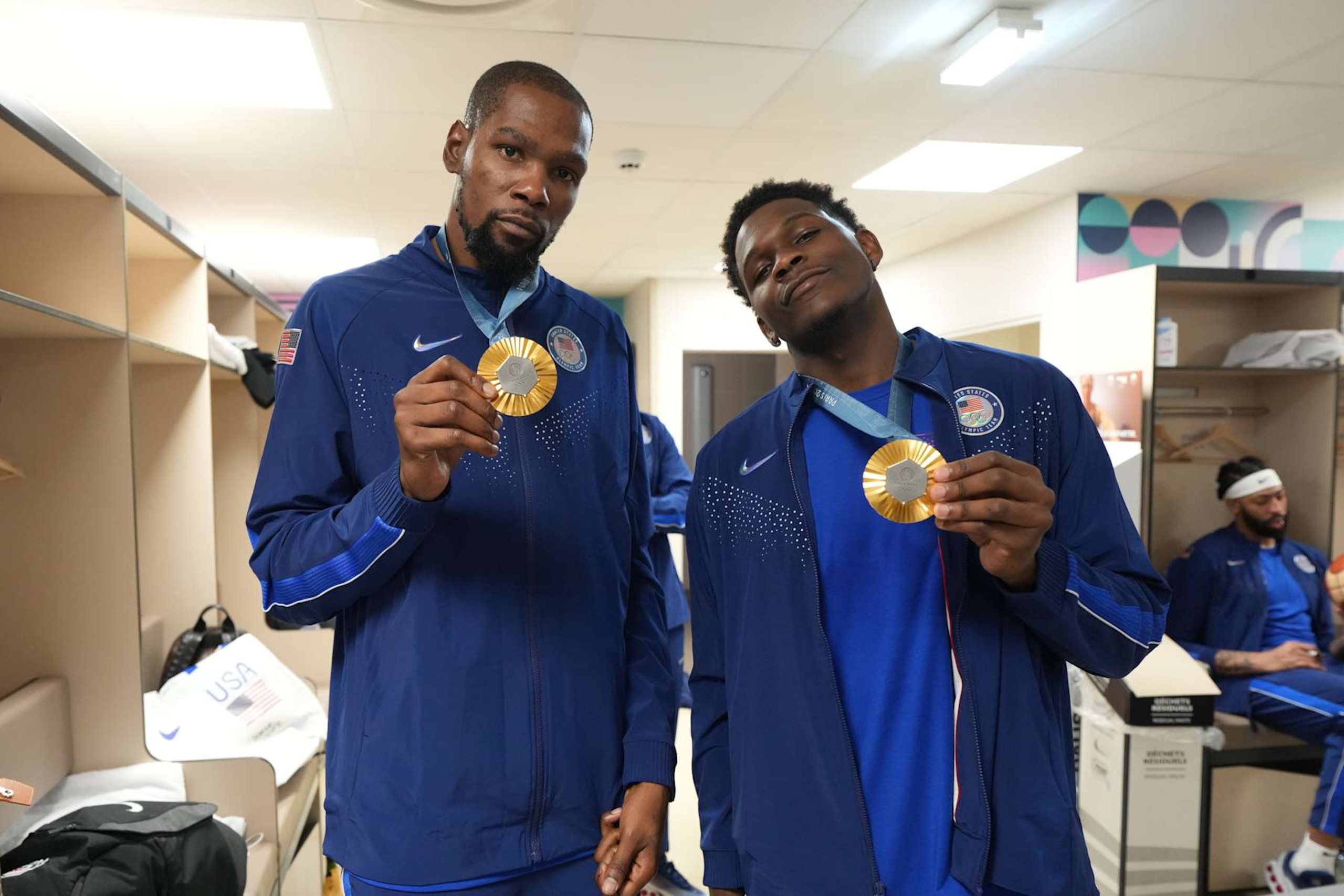 PARIS, FRANCE - AUGUST 10: Kevin Durant #7 and Anthony Edwards #5 of Team USA pose for a photo after winning the Men's Gold Medal Game on August 10, 2024 at the AccorHotels Arena in Paris, France. NOTE TO USER: User expressly acknowledges and agrees that, by downloading and/or using this photograph, user is consenting to the terms and conditions of the Getty Images License Agreement. Mandatory Copyright Notice: Copyright 2024 NBAE (Photo by Jesse D. Garrabrant/NBAE via Getty Images)